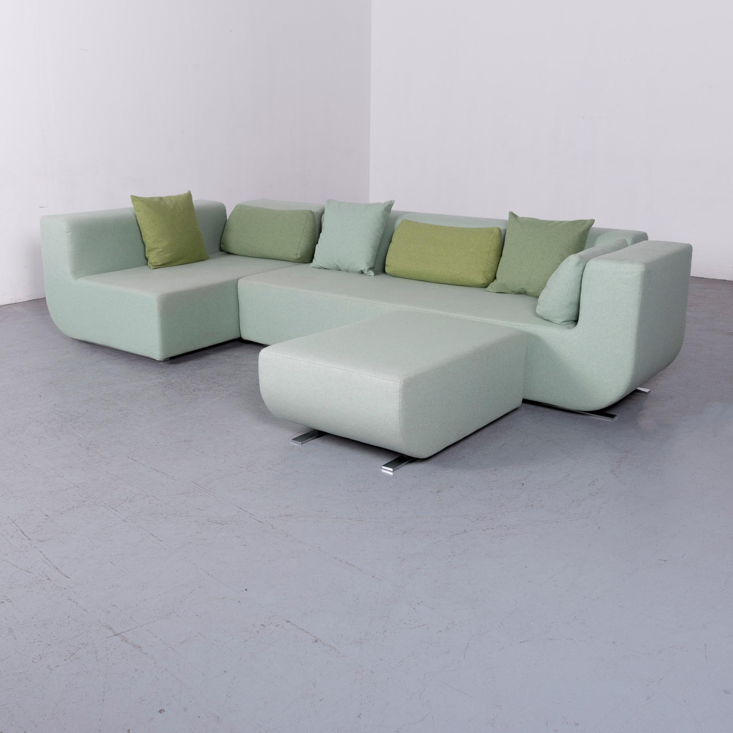 We bring to you a COR Nuba designer fabric sofa green corner couch.
















