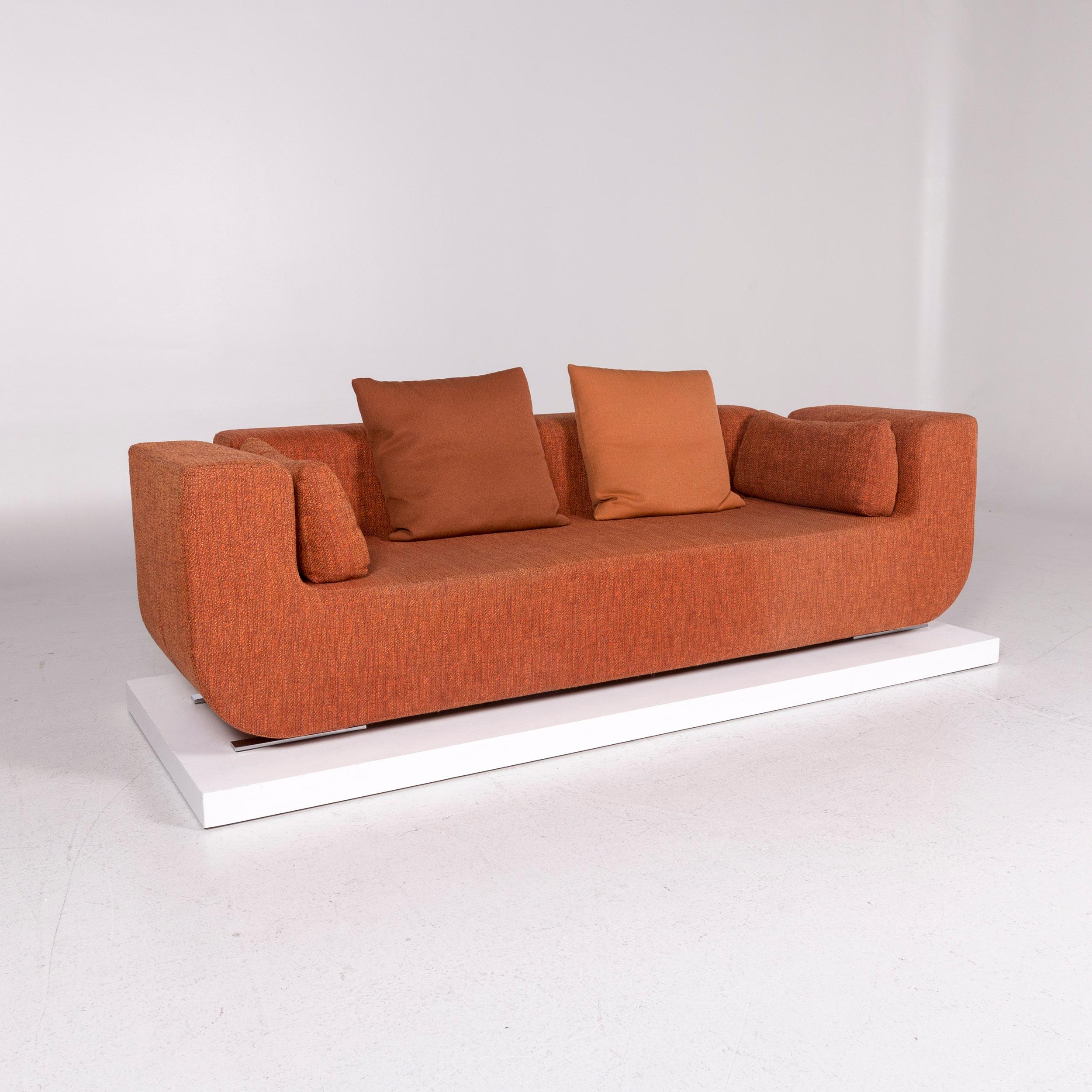 We bring to you a COR Nuba orange fabric sofa set 1 three-seat 1 stool.

 

 Product measurements in centimeters:
 

Depth 97
Width 250
Height 78
Seat-height 40
Rest-height 70
Seat-depth 50
Seat-width 162
Back-height 37.