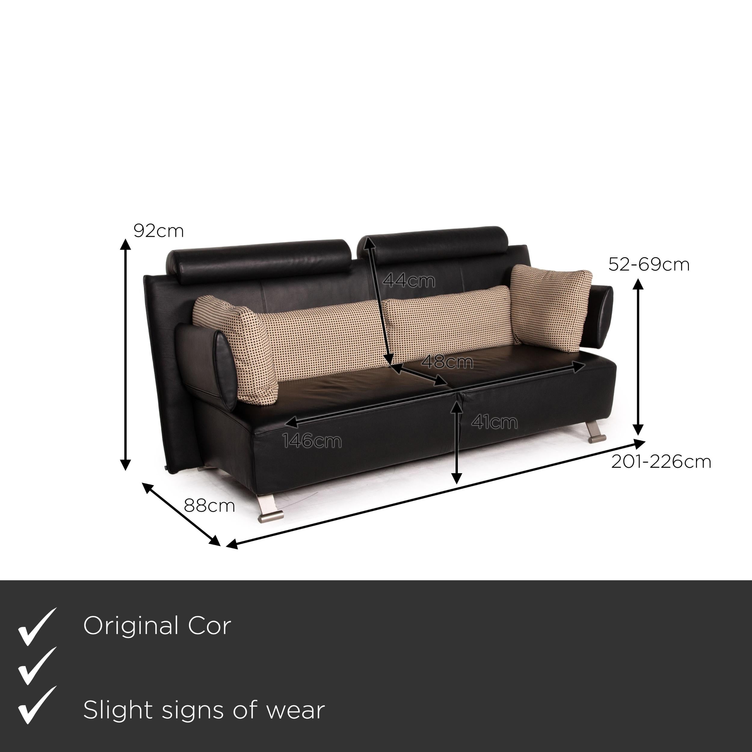 We present to you a Cor Sera leather sofa black two-seater function couch.
  
 

 Product measurements in centimeters:
 

 depth: 88
 width: 201
 height: 92
 seat height: 41
 rest height: 52
 seat depth: 48
 seat width: 146
 back