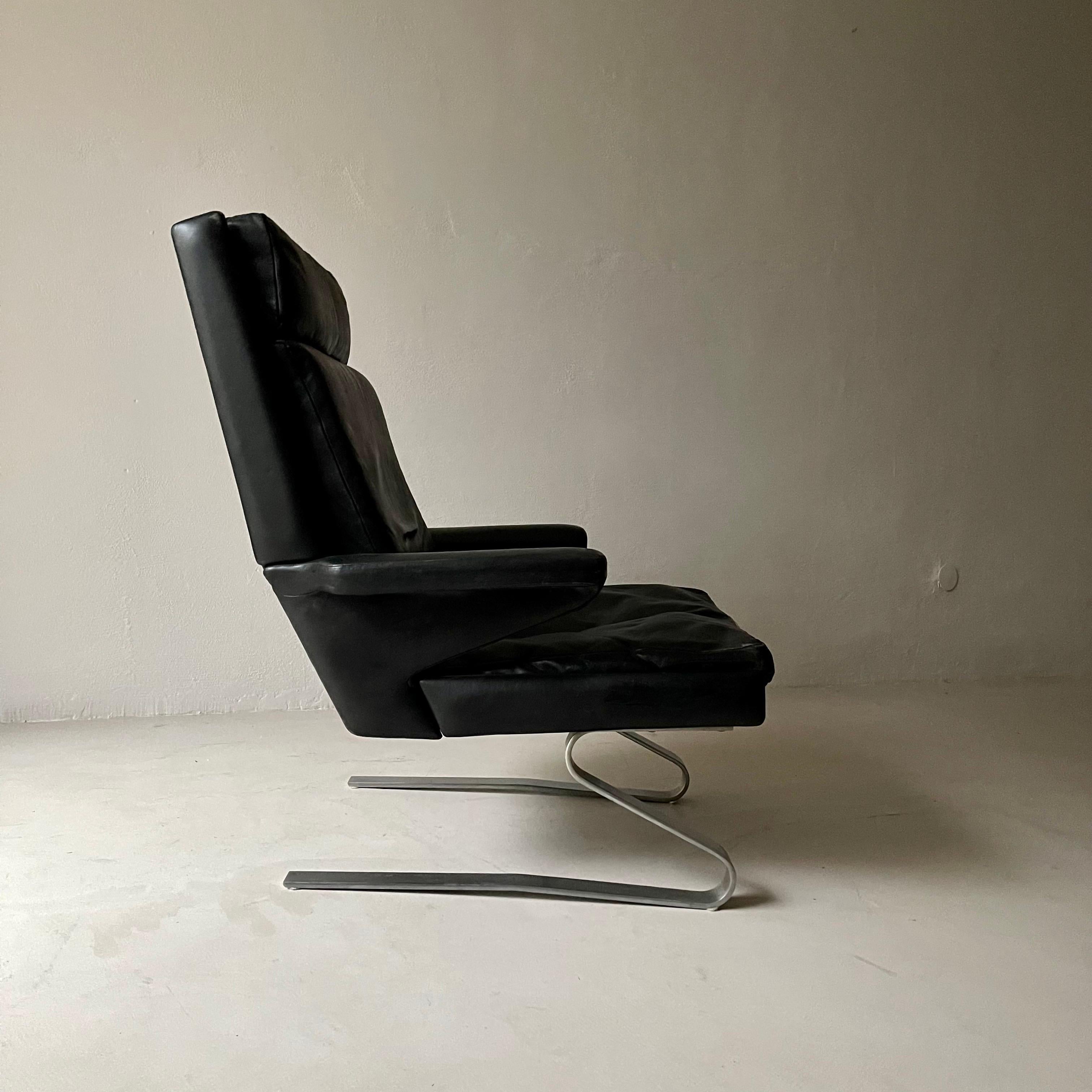 COR Swing Designer-Sessel aus Leder mit Ottomane im Angebot 2