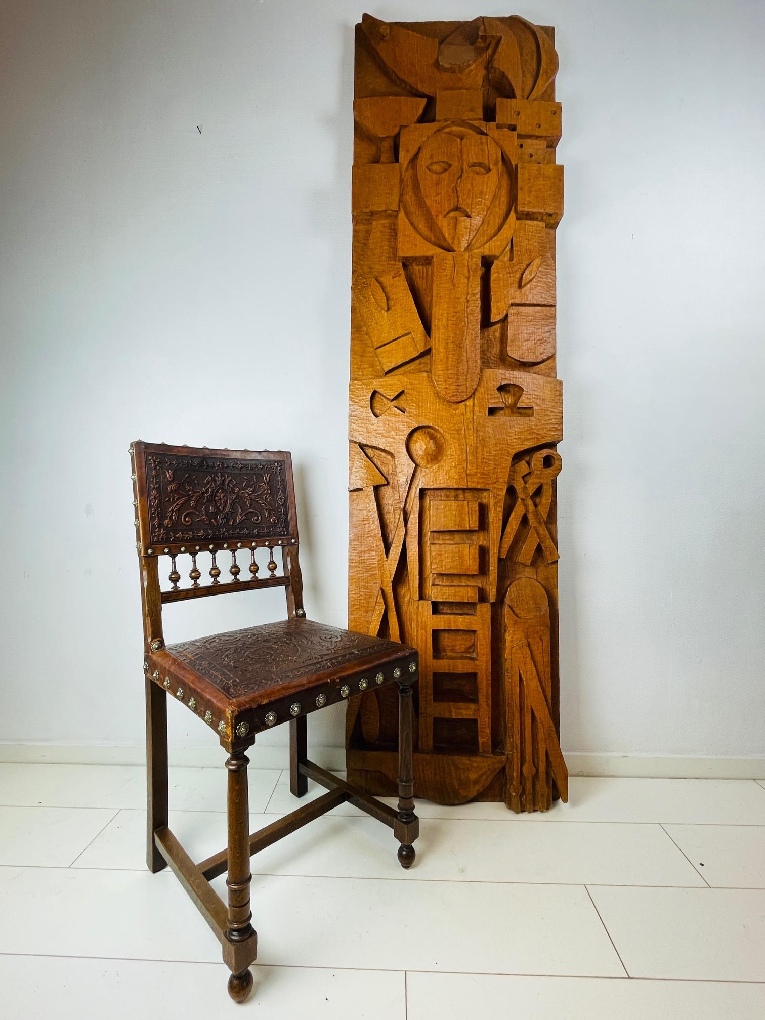 What a piece of religious art! This huge Arma Christi is made by Dutch sculptor Cor Triller. This huge carving is made in 1965 and is made of one piece of solid wood. It is in absolutely perfect condition. It symbolizes the Arme Christi or the