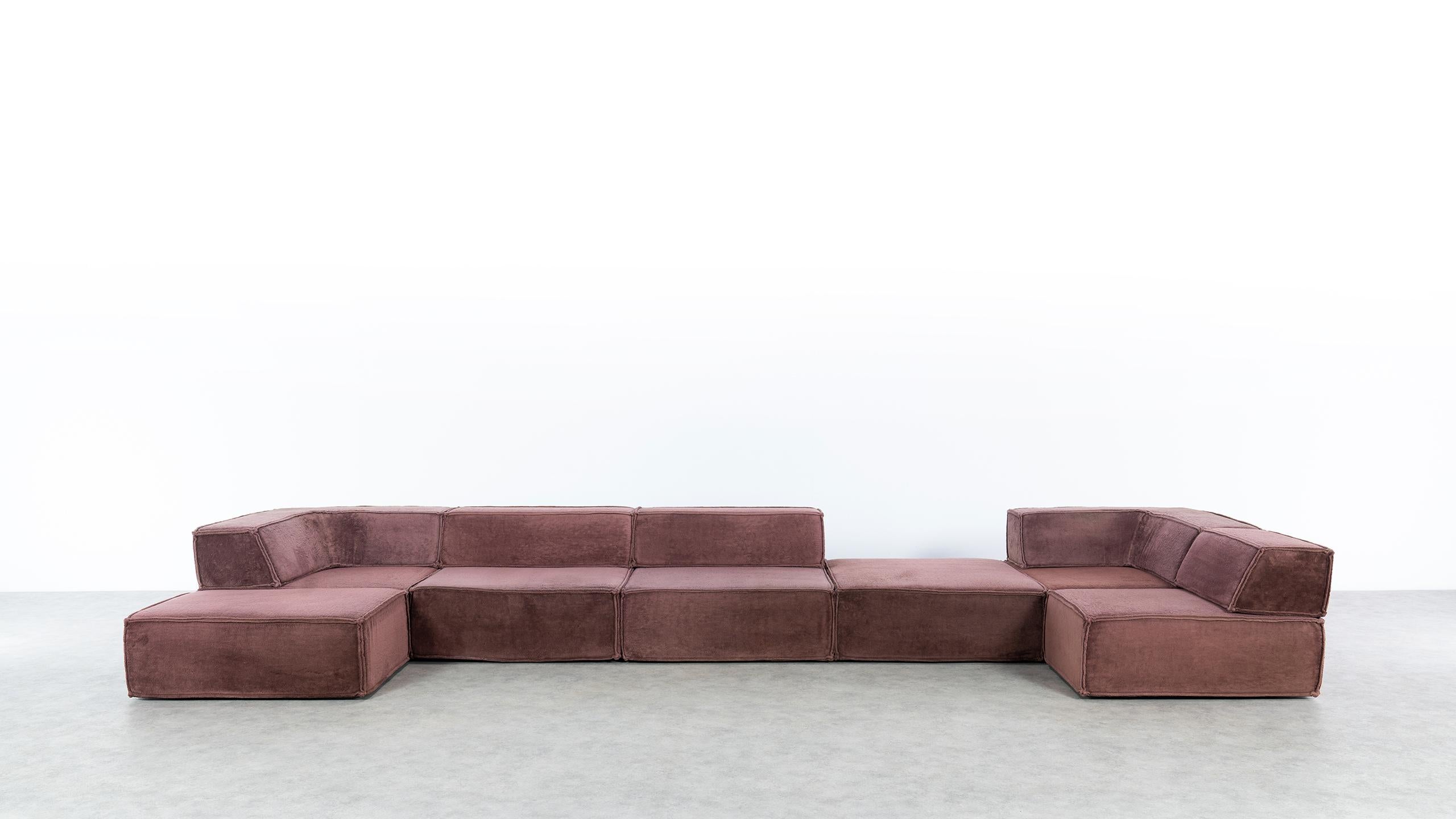 The modular sofa system, which was created in 1972 by Team Form AG in Switzerland for COR, blends seamlessly into any environment. 
Taking the backrest away it can also be used as a very comfortable bed.

The double outer seam lends trio an