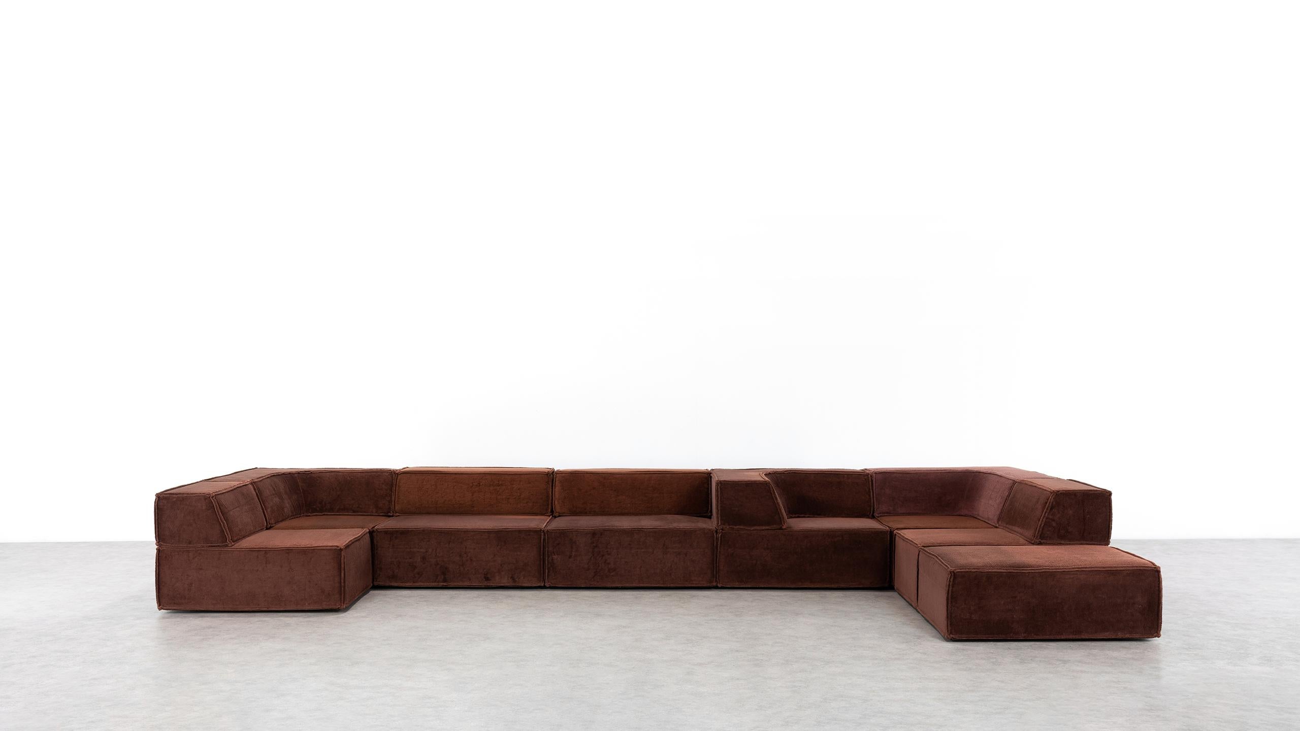 COR trio modular sofa, Giant Landscape in chocolate brown, 1972 by Team Form Ag.

The modular sofa system, which was created in 1972 by Team Form AG in Switzerland for COR, blends seamlessly into any environment. Taking the backrest away it can