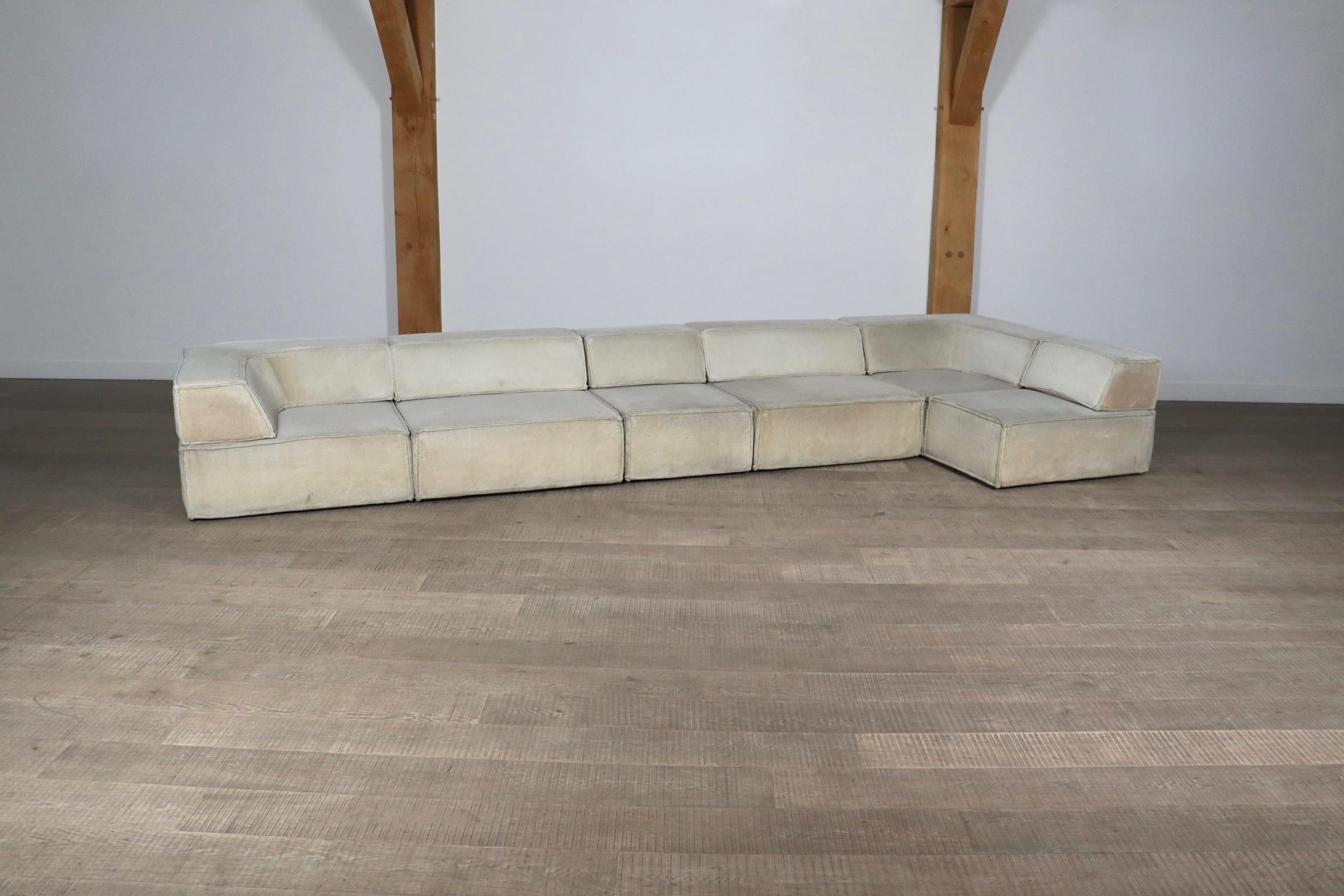 The iconic modular sofa COR trio, executed in the original light beige teddy fabric. The Cor Trio design was created in 1972 by Team Form AG in Switzerland for COR, and is still popular today due to its timeless design and high comfort.

This sofa