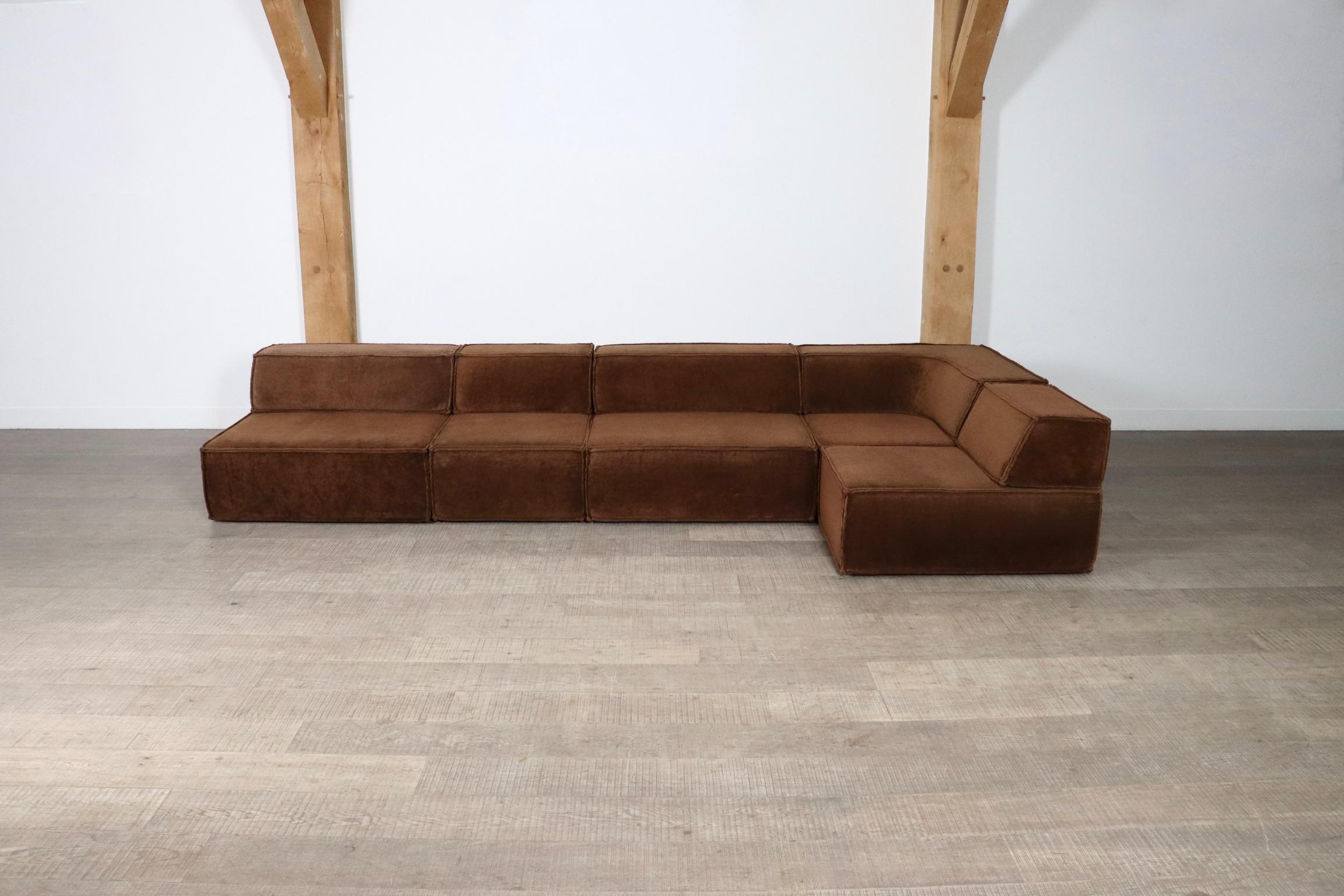 The iconic modular sofa COR trio, executed in the original brown teddy fabric. The Cor Trio design was created in 1972 by Team Form AG in Switzerland for COR, and is still popular today due to its timeless design and high comfort.

This sofa