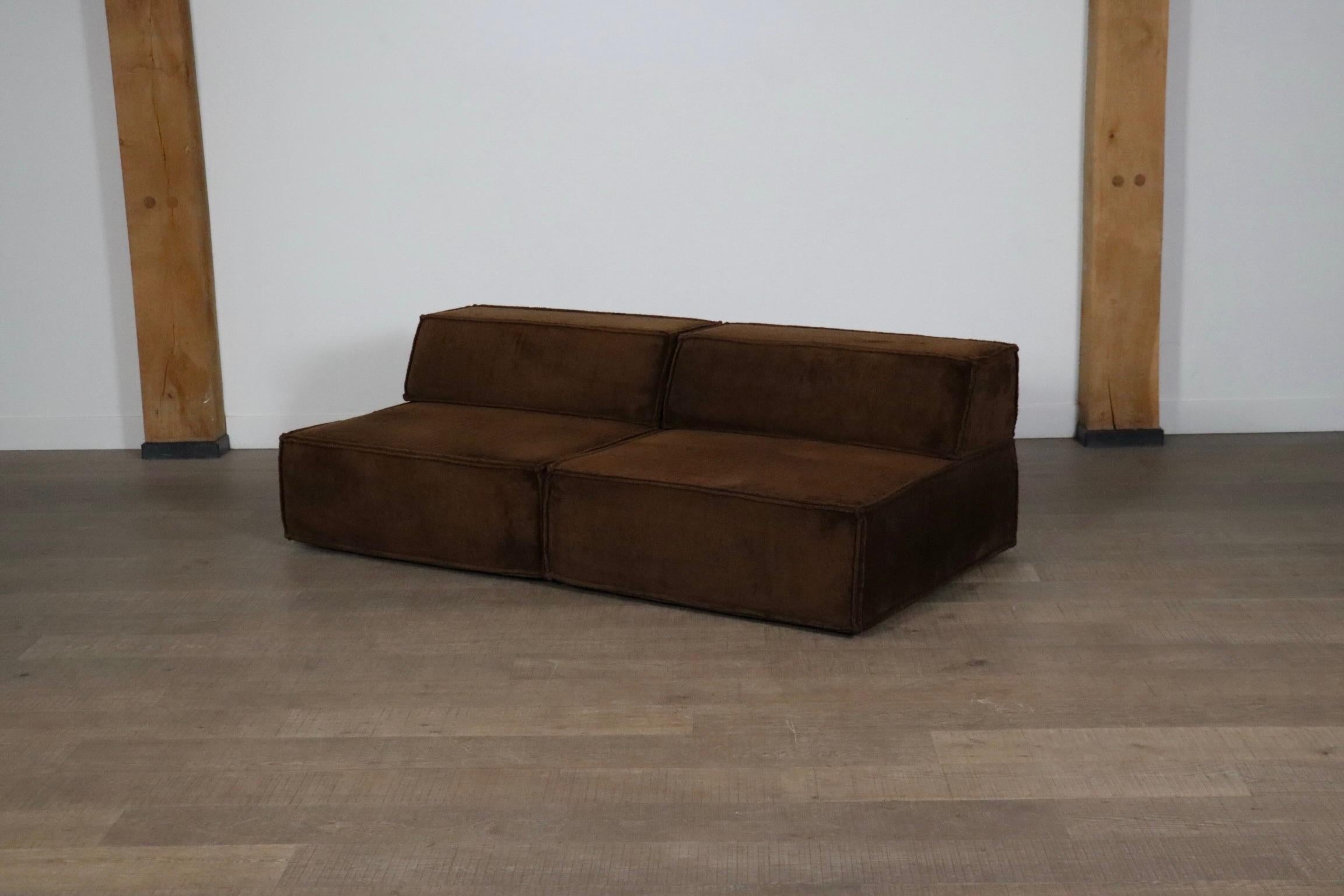 The iconic modular sofa COR trio, executed in the original brown teddy fabric. The Cor Trio design was created in 1972 by Team Form AG in Switzerland for COR, and is still popular today due to its timeless design and high comfort.

This sofa