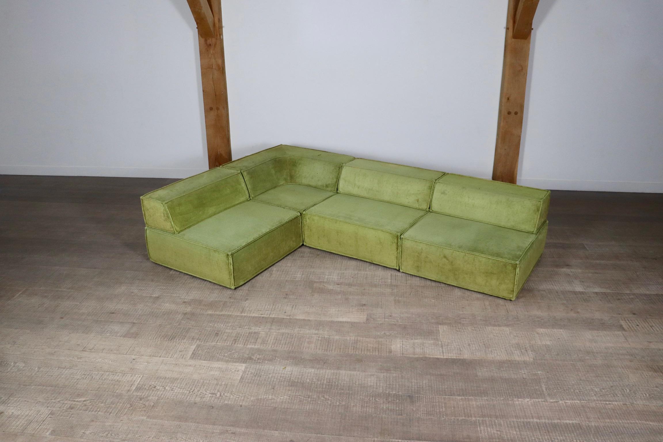 The iconic modular sofa COR trio, executed in the original green teddy fabric. The Cor Trio design was created in 1972 by Team Form AG in Switzerland for COR, and is still popular today due to its timeless design and high comfort.

This sofa