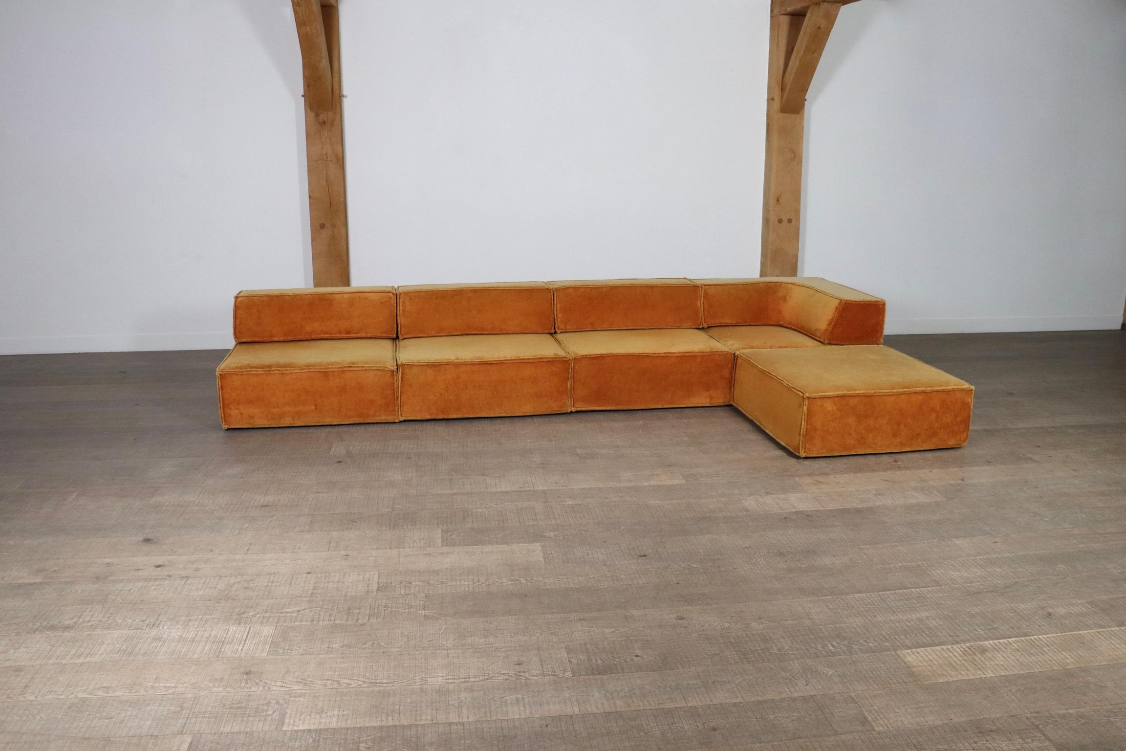 The iconic modular sofa COR trio, executed in a stunning original orange teddy fabric. The Cor Trio design was created in 1972 by Team Form AG in Switzerland for COR, and is still popular today due to its timeless design and high comfort.

This