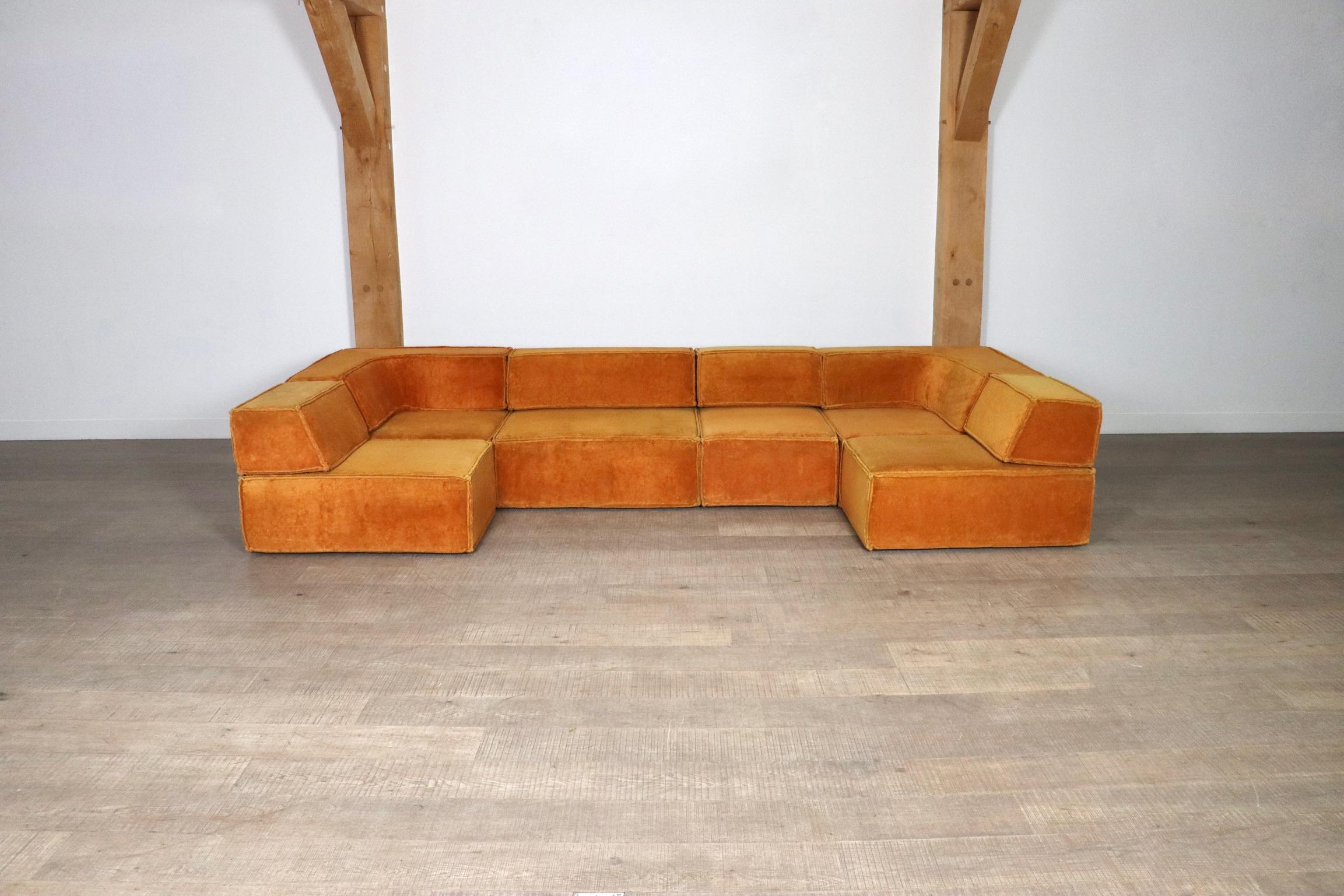 The iconic modular sofa COR trio, executed in a stunning orange teddy fabric. The Cor Trio design was created in 1972 by Team Form AG in Switzerland for COR, and is still popular today due to its timeless design and high comfort.

This sofa consists