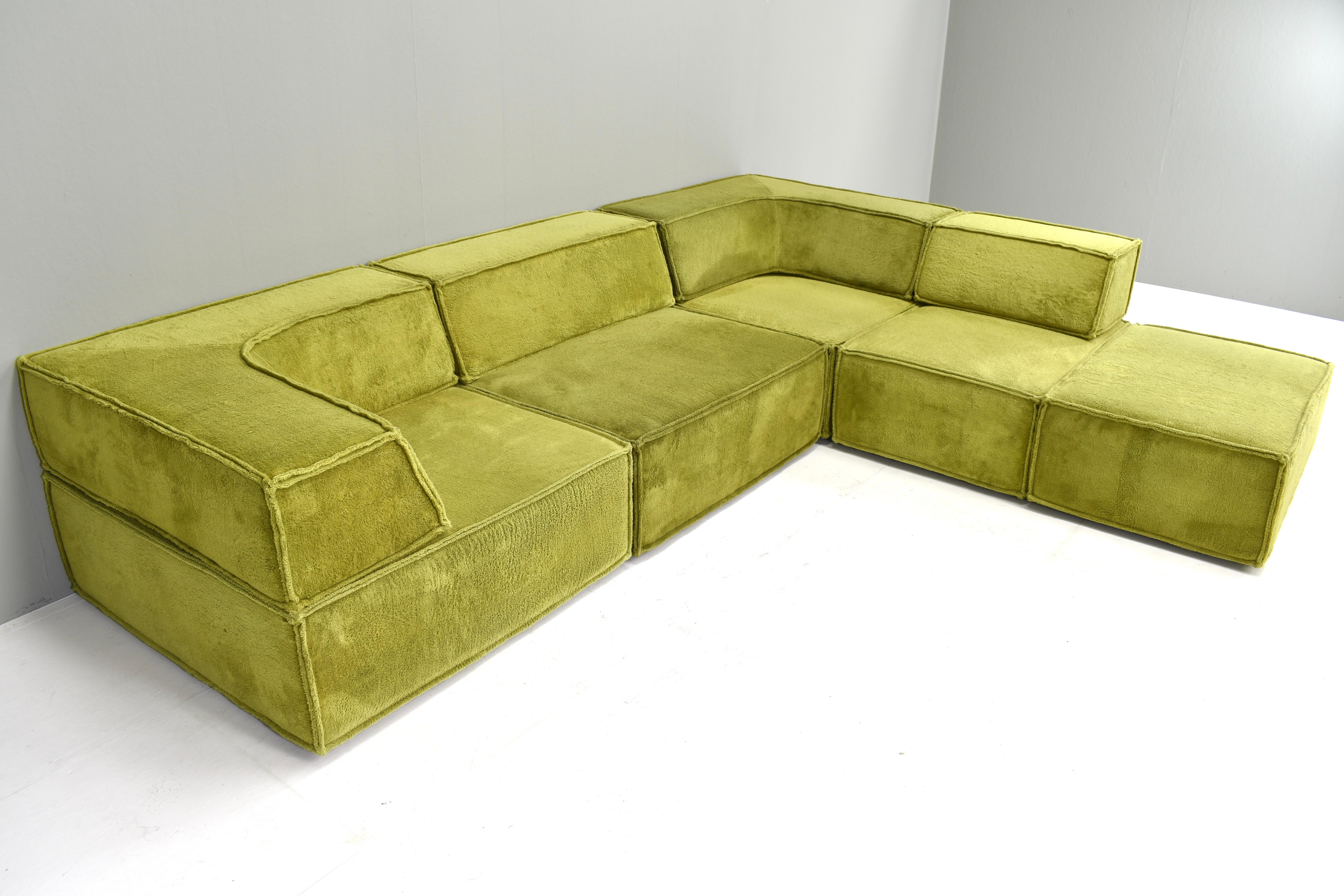 Amazing large COR Trio sectional sofa in original green teddy fabric. The sofa has one large backrest extra than shown on the pictures (11 pieces in total). 
Original green teddy fabric.
Labeled COR
Reupholstery is certainly NOT necessary but