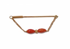 Corail, broche en or jaune 18 carats.