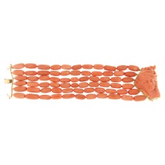 Bracelet manchette en or jaune 18 carats et corail