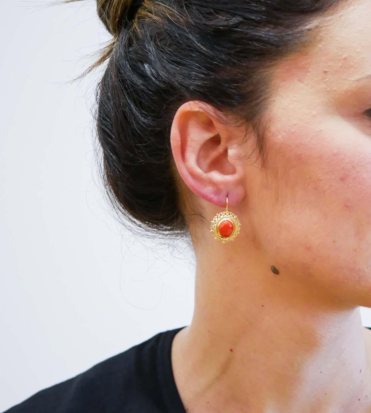 Mixed Cut Coral, 18 Karat Yellow Gold Earrings.