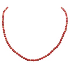 Coral, 18 Karat Yellow Gold.