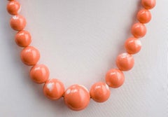 Koralle, Halskette aus 18 Karat Gelbgold.