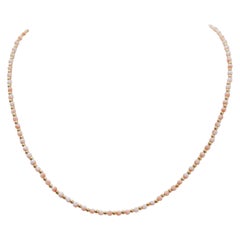 Collier en or jaune 18 carats et corail.