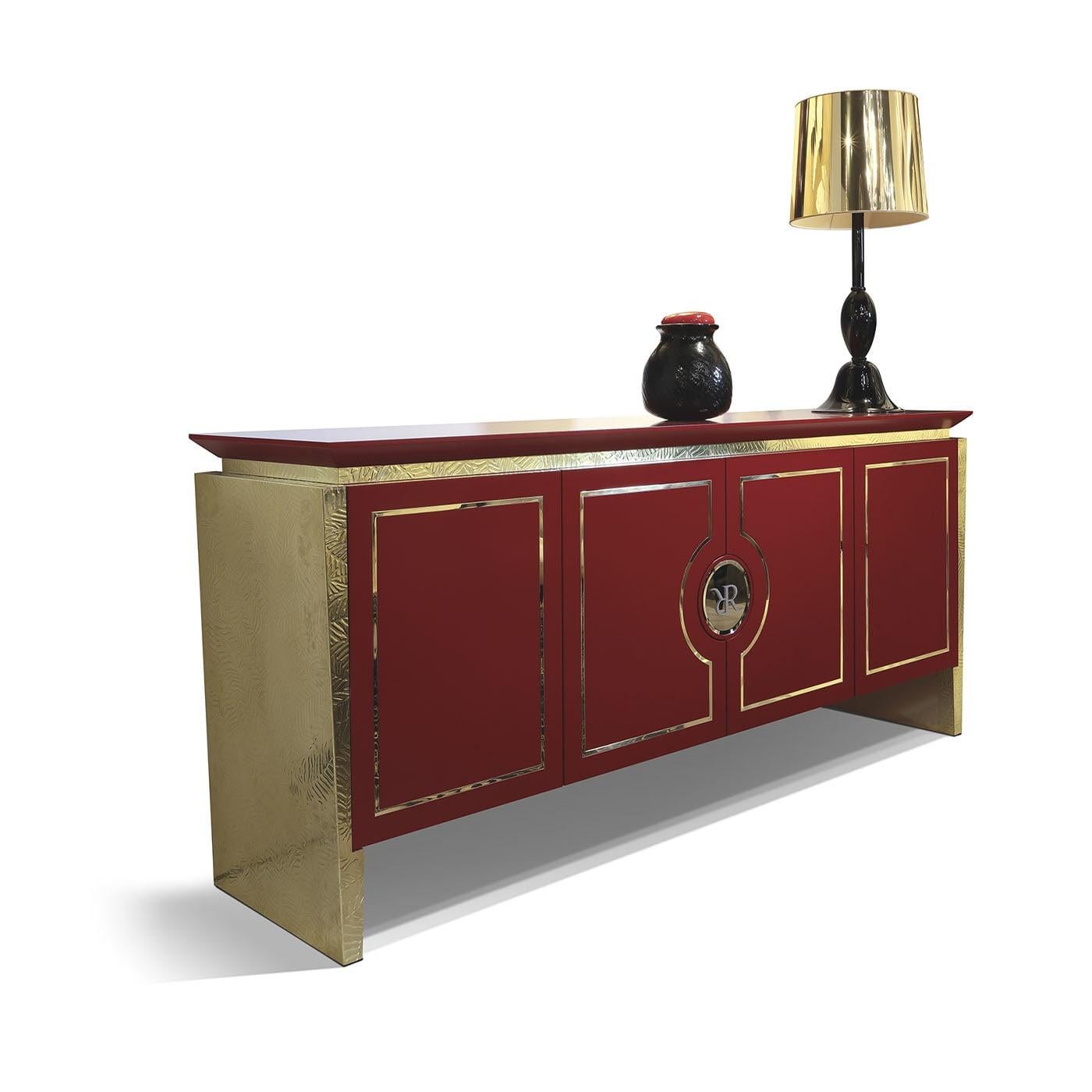 Daring in its color scheme as it is in its dynamic-cut lines, this sideboard is sure to be the focal point of exclusive modern decors. Chiseled by hand, the brass panels making up its frame sport a gleaming golden tone that illuminates the rest of