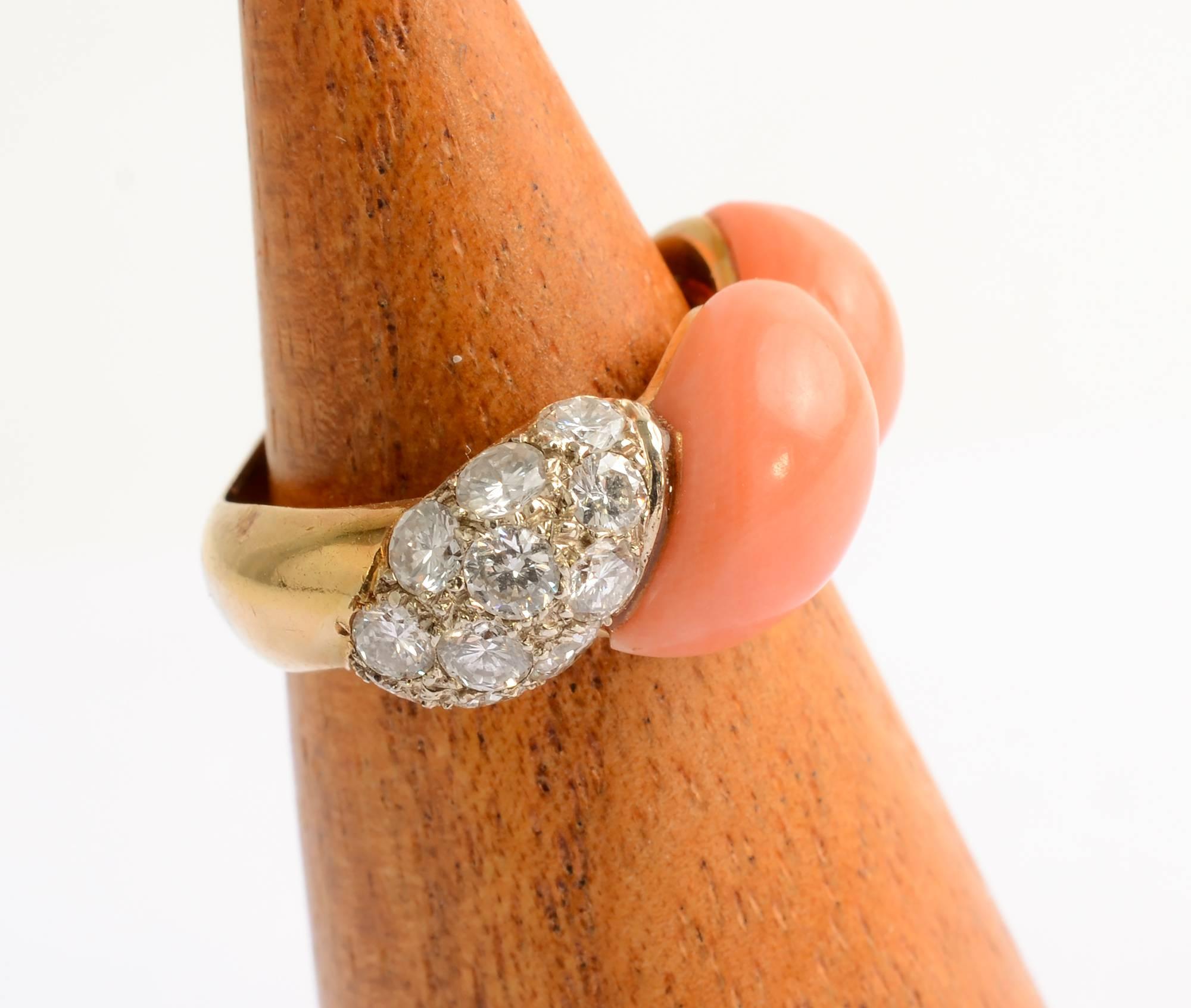 Stylish gold ring with beautifully colored coral and diamonds. The diamonds are set to echo the shape of the carved coral.
The ring is size 5 1/4 but can easily be modified. Matching earrings are available as item  LU1334123953.