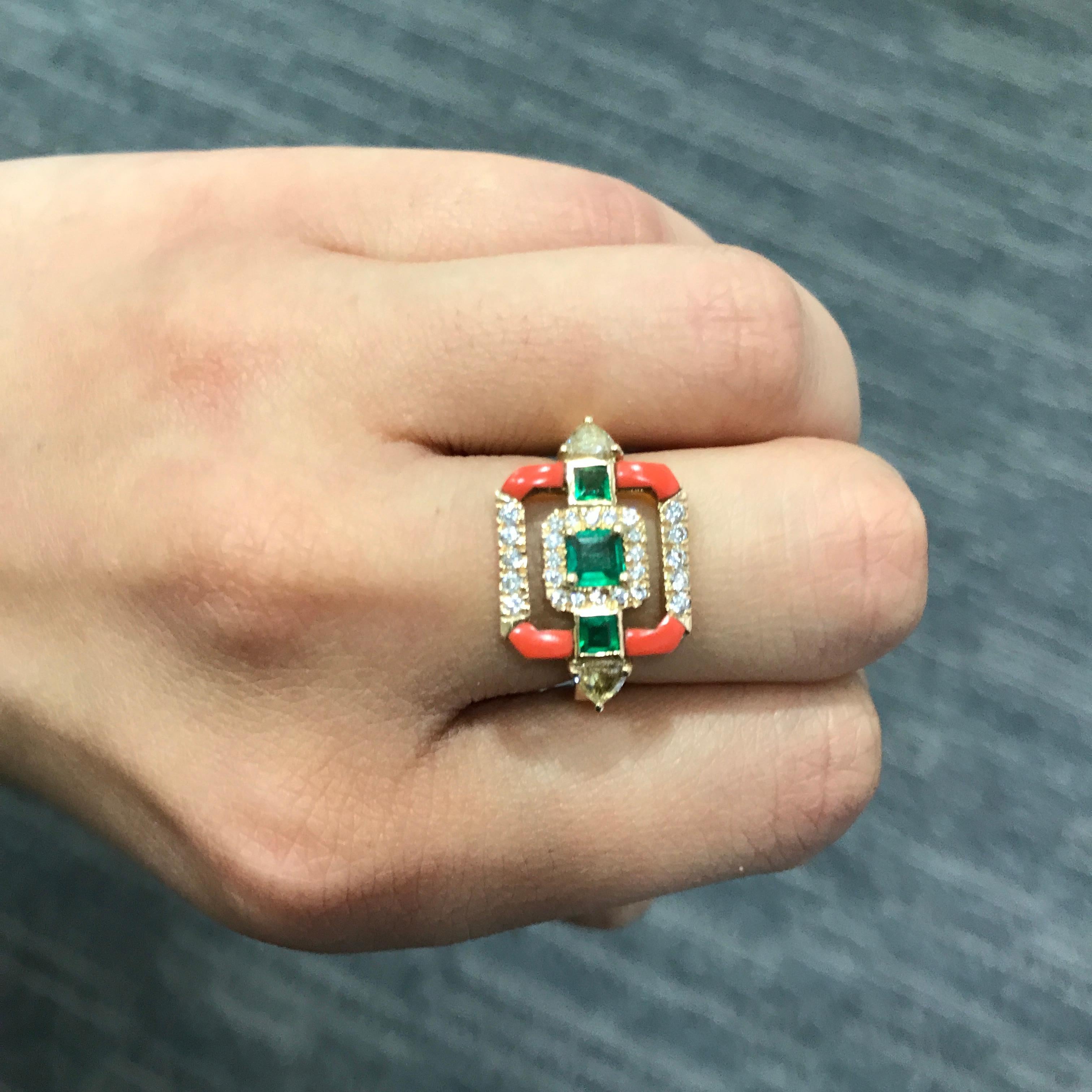 A beautiful, contemporary ring - with Zambian Emeralds, Diamonds all set in 18K yellow gold. Matching pair of earrings are also available. 