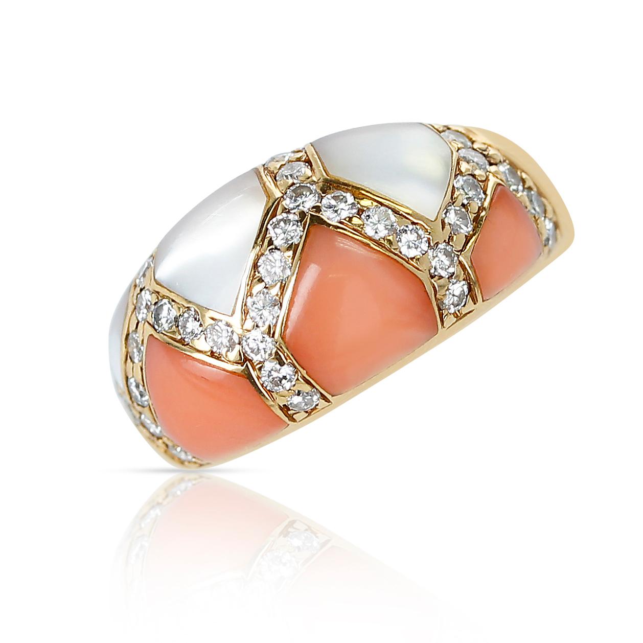 A Coral and Mother of Pearl Ring with Diamonds, made in 18 Karat Yellow Gold. The coral and mother of pearl are in pentagonal shapes. Ring Size US 6. Total weight: 8.45 grams.