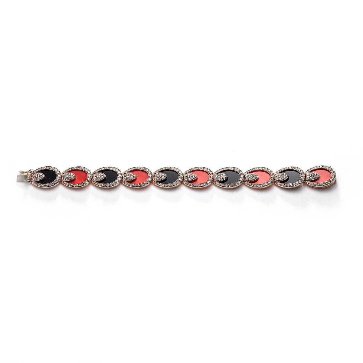 Bracelet in 18kt pink gold set with 374 diamonds 4.98 cts, 5 onyx 8.42 cts and 5 coral 5.99 cts   