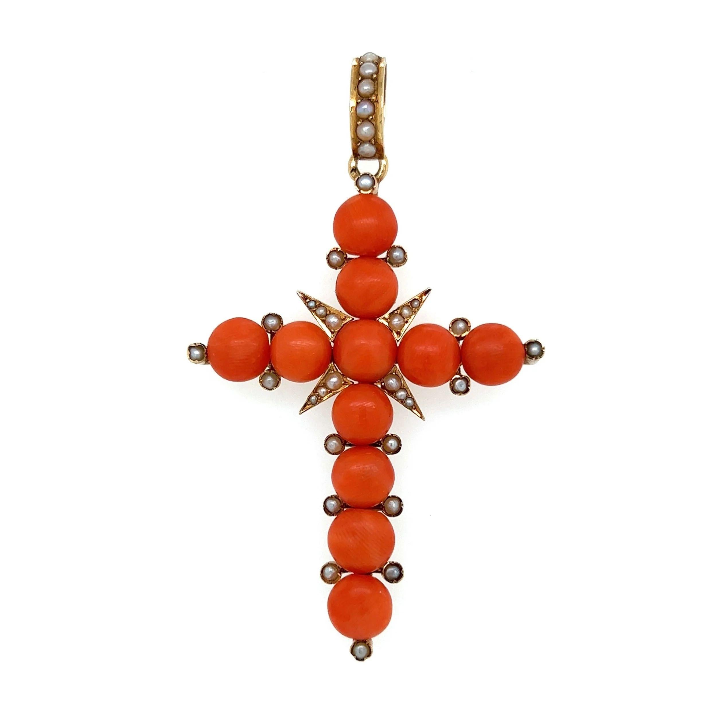 Simply Beautiful! Red Coral and Seed Pearl Victorian French Cross Pendant. Securely Hand set with 11 Deep Red Coral, accented by Seed Pearls. Beautifully mounted in Hand crafted 18K Yellow Gold. Cross measures approx. 2.70” l x 1.60” w x 0.31” h.
