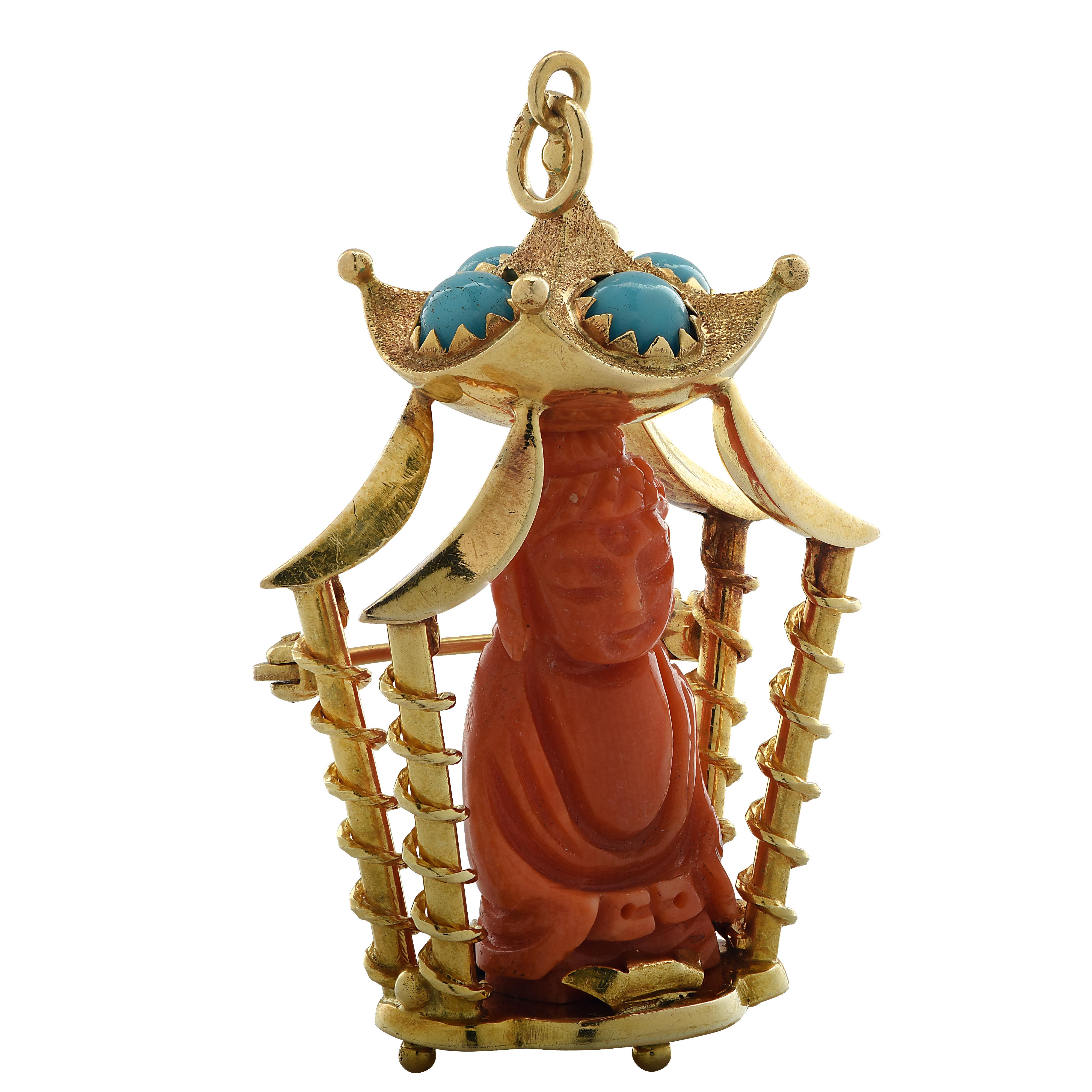 Beautiful brooch pin/pendant crafted in 18 karat yellow gold, featuring a sacred Buddha statue carved from coral, sitting in a pagoda adorned with 4 round turquoise beads. This serene brooch pin/pendant measures 1.8 inches in length, 1.1 inches at