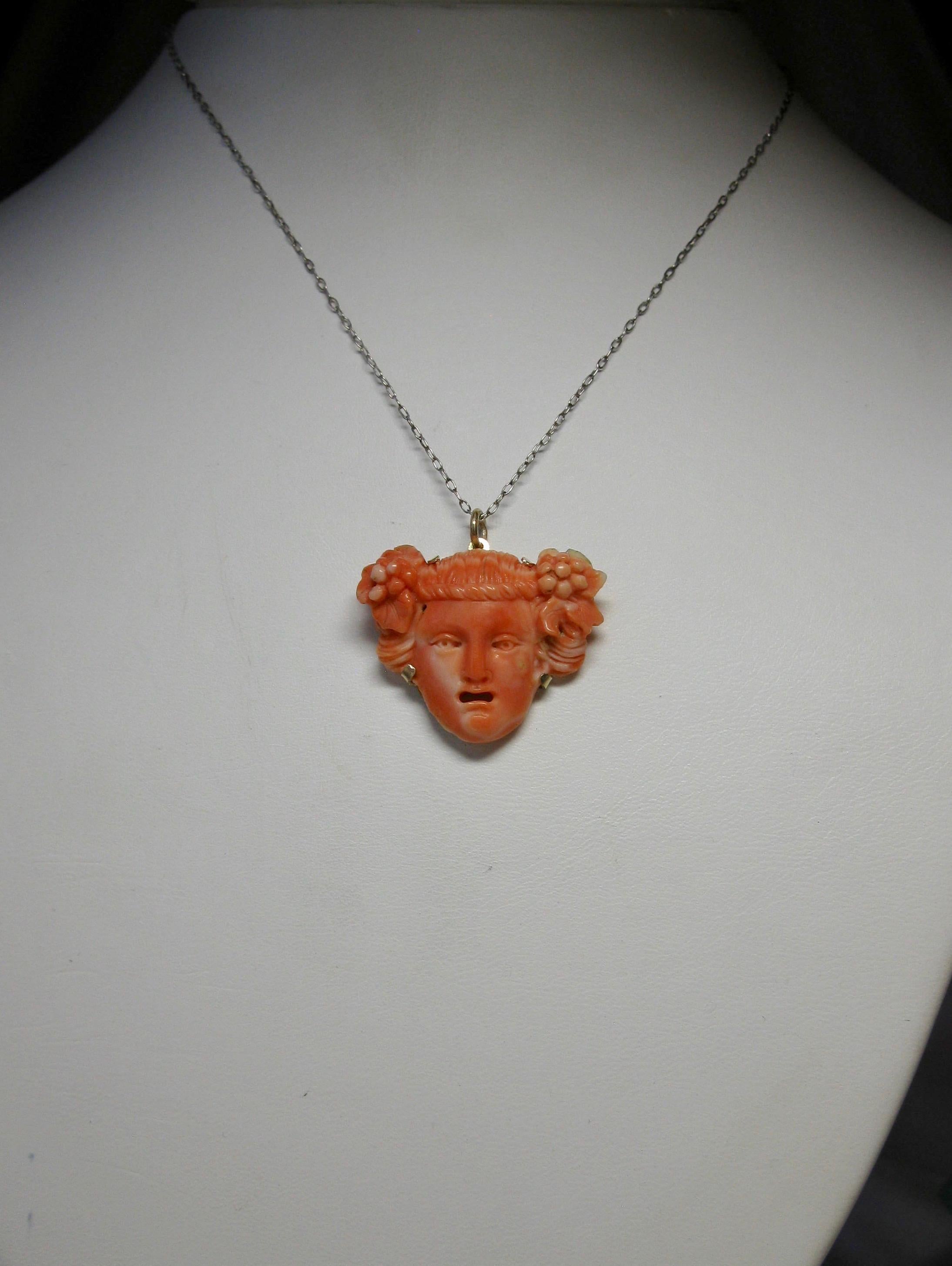 carved coral pendant