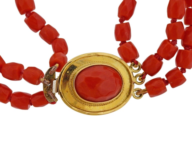 18k yellow gold coral bead necklace, featuring corals from 4.5mm to 10mm.  Necklace is 27