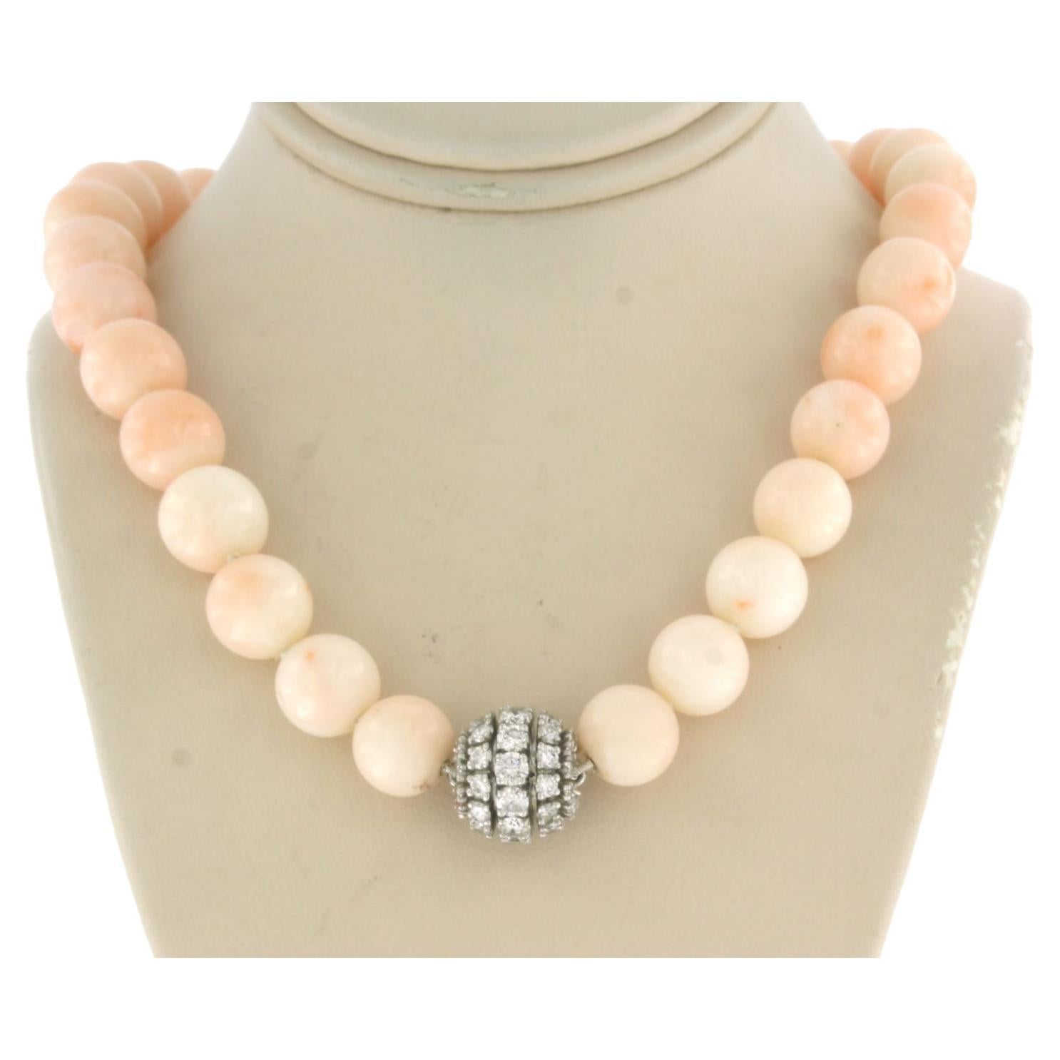 Coral bead necklace on a 18k white gold lock set with diamonds For Sale ...