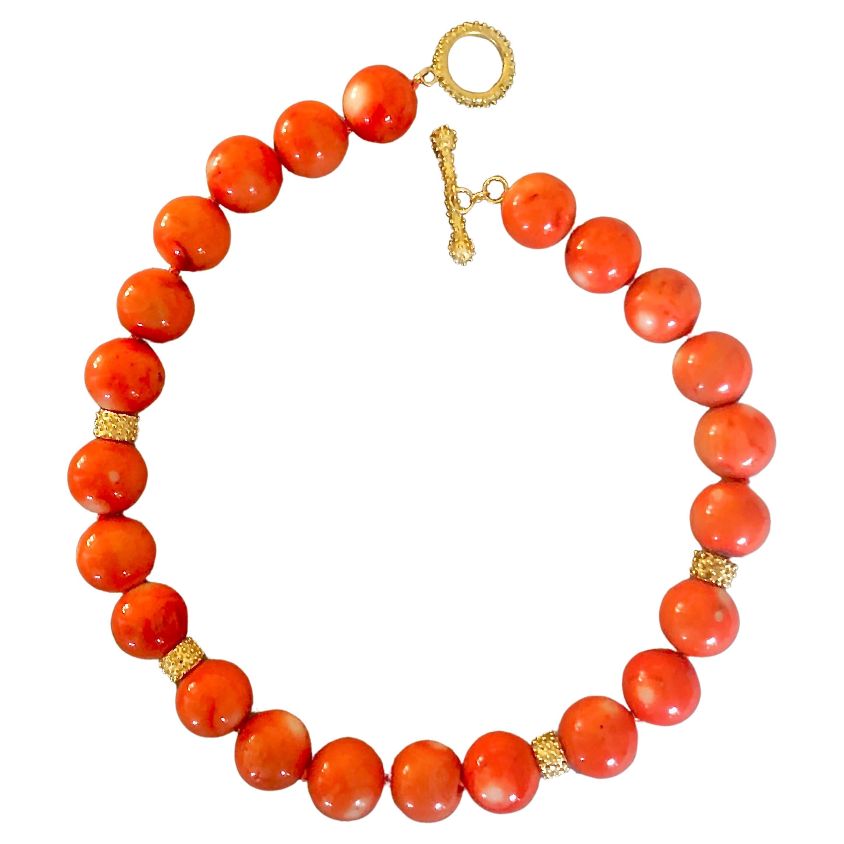 Coral beads with 14kt. gold granulated textured clasp w/ large rondelles For Sale