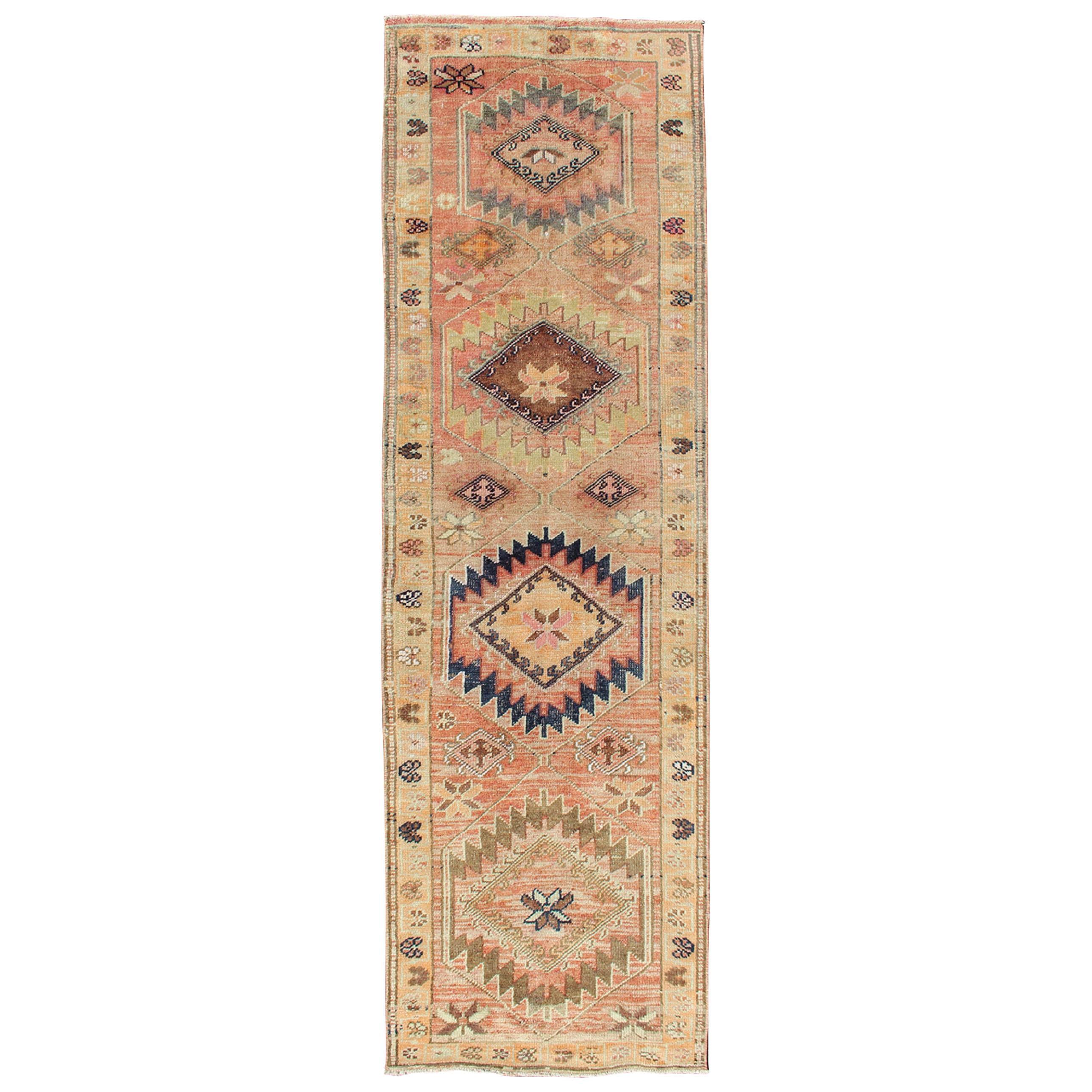 Coral colored Vintage Oushak Runner with Geometric Medallions For Sale