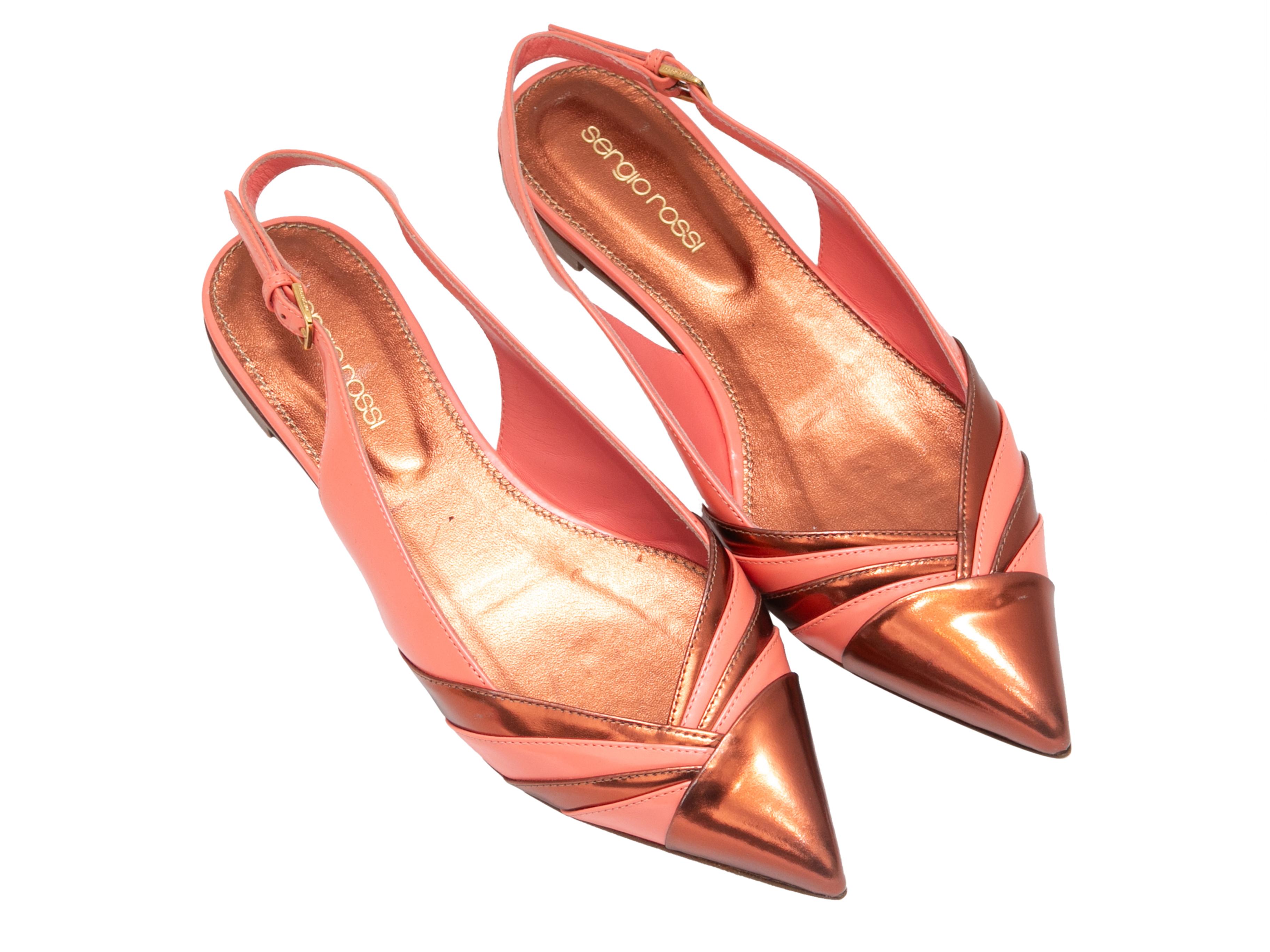 Coral and copper patent leather pointed-toe slingback flats by Sergio Rossi. Buckle closures at slingback straps. 0.75