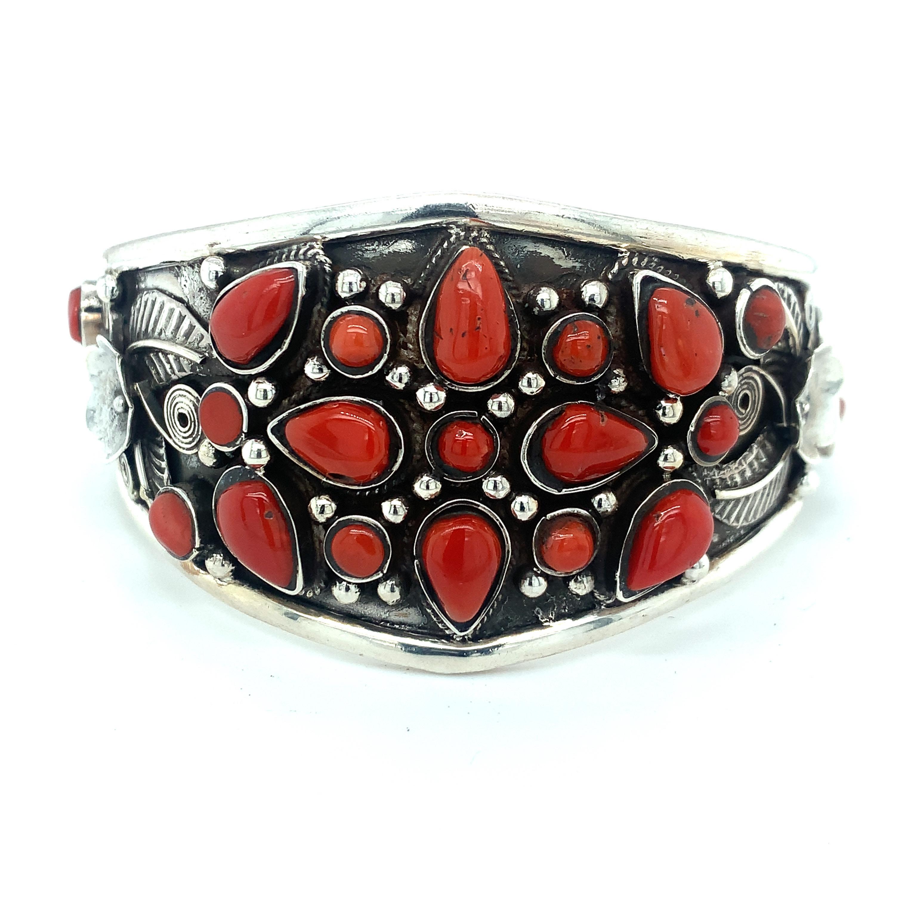The bangle is one of a kind hand crafted by skilled silversmiths ,This is really reasonably priced  coral are cut and polished by members of same family so not extra cost paid to stone supplier. This is brand new piece designed by family members of