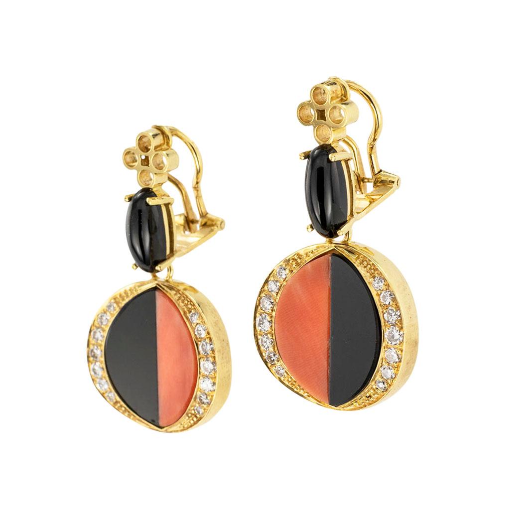 Coral black onyx and diamond yellow gold clip-on drop earrings circa 1970.  Clear and concise information you want to know is listed below.  Contact us right away if you have additional questions.  We are here to connect you with beautiful and