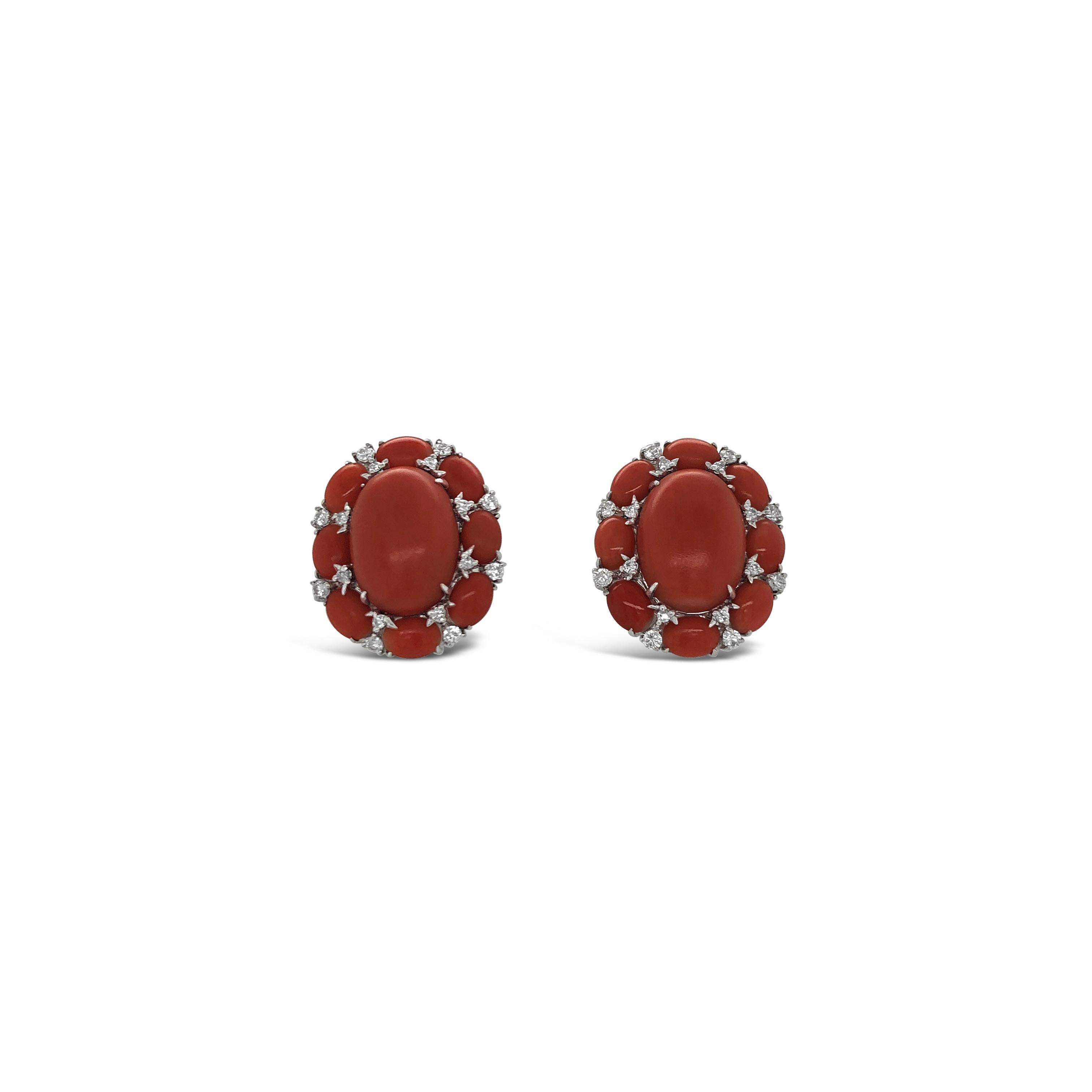 18K White Gold and Diamond Coral Earrings that Clip On.  
32 ROUND DIAMONDS 
Stamped 18K and 750
Oval Coral 