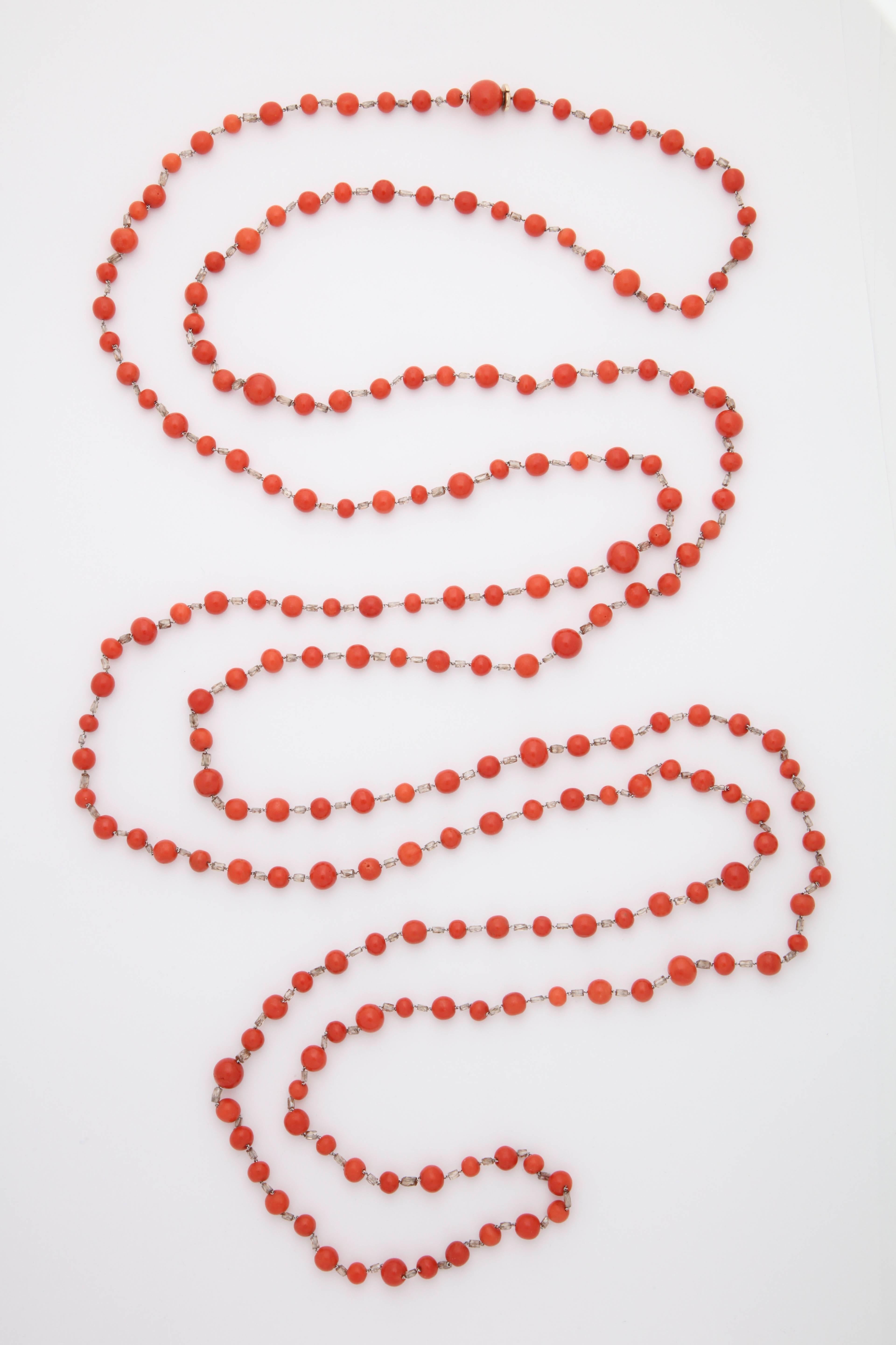 A necklace composed of round coral beads alternating with faceted diamond beads. There are 202 diamonds weighing approximately 30cts.
Length: 97.00 inches