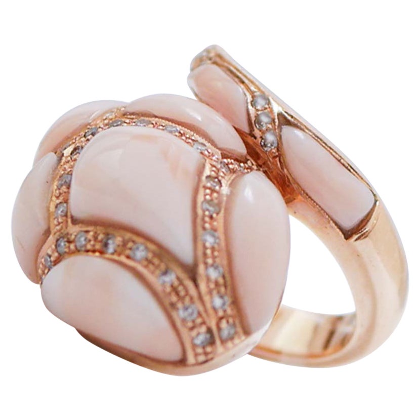 Coral, Diamants, Bague serpent en or rose 14 carats.