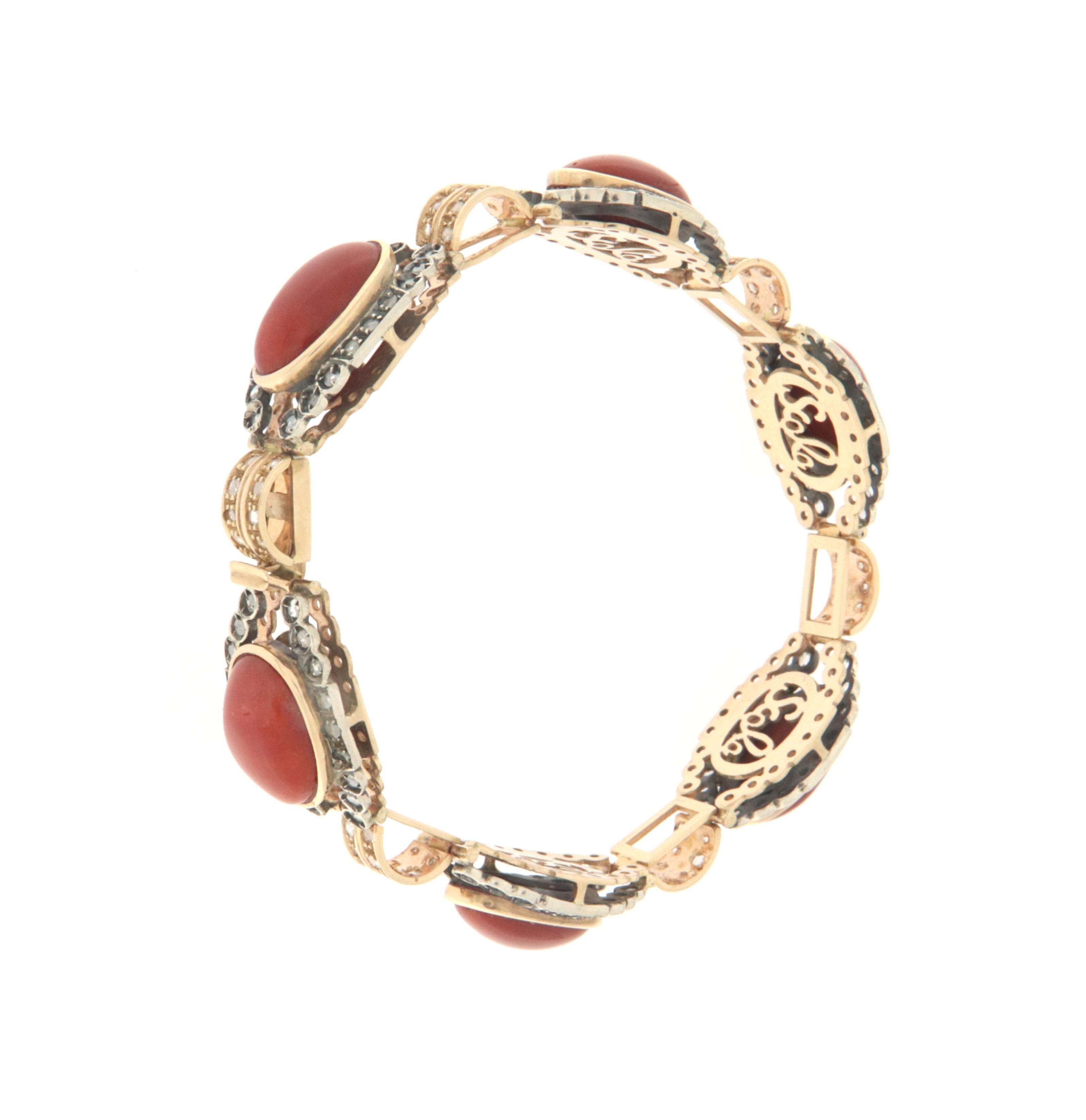 Bracelet 14 karat yellow gold and 800 silver thousandths  cuff bracelet.  Handmade by craftsmen assembled with natural coral and rose cut diamonds
 
Bracelet total weight 32.10 grams 
Diamonds weight 1.53 karat
Coral weight 6.30 grams
Size Bracelet