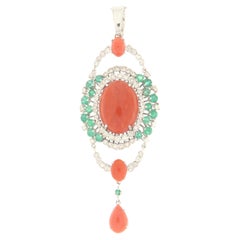 Collier pendentif en or blanc 18 carats corail diamants émeraudes