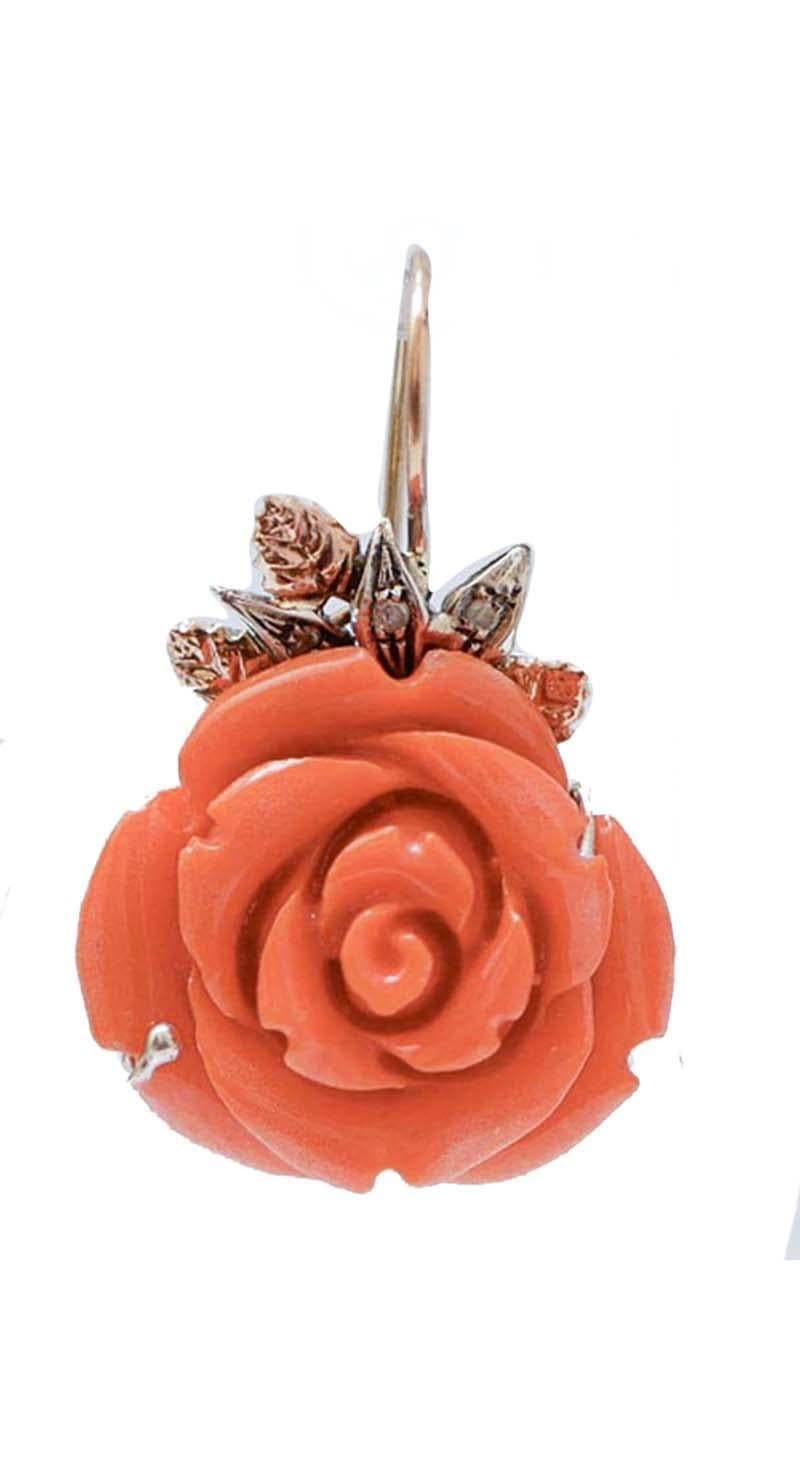  Dangle earrings in 9 kt rose gold and silver structure mounted with leaves studded with diamonds and, as pendant, a flower of coral paste.
Diamonds 0.12 ct
Coral Paste 7.30 gr
Total Weight 12.80 gr
RF  *RHE

For any informations, feel free to