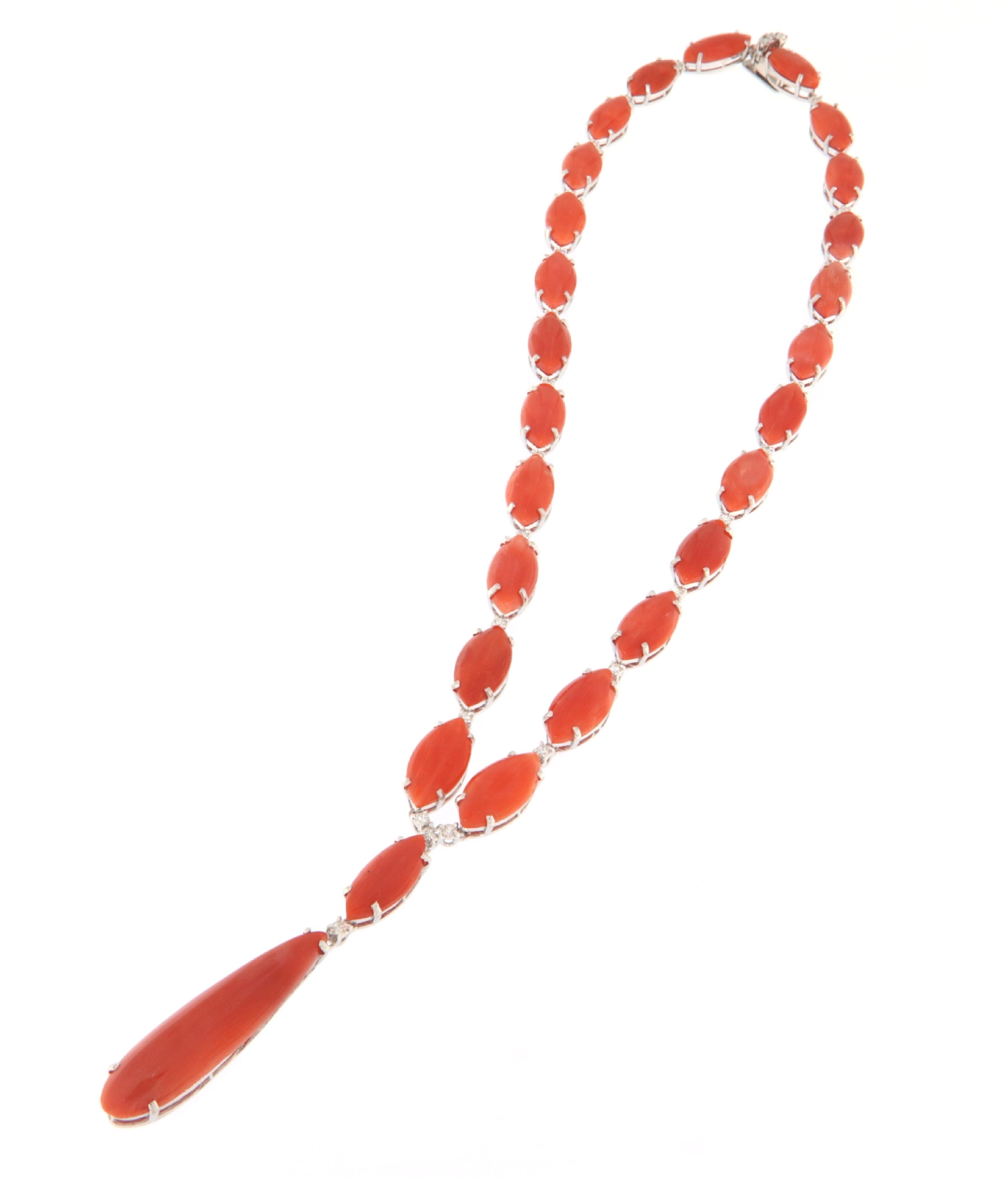 
This 18-karat white gold necklace is a celebration of elegance and refinement, pairing sparkling diamonds with natural red coral from Sardinia, known for its vivid color and exceptional quality. A magnificent example of jewelry craftsmanship, this