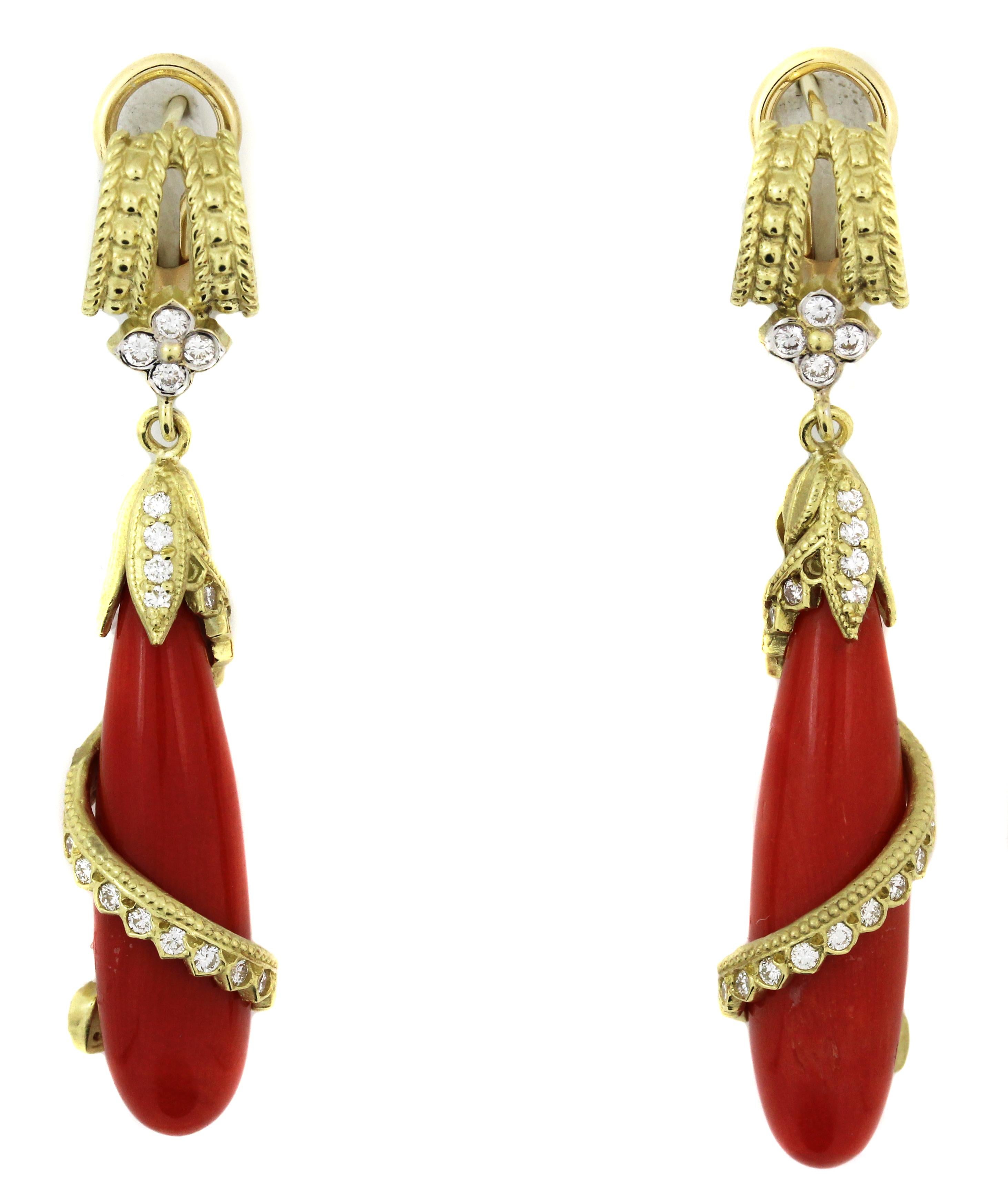 Twisted 18K Yellow Gold and Diamond Earrings with Coral Drops

Beautiful Sardinian Coral drops, 8mm x 30mm 

0.75ct. G Color, VS Clarity diamonds

Post-omega backs

Earrings are 2 inches in length

Has the Stambolian Diamond Heart

Made in USA