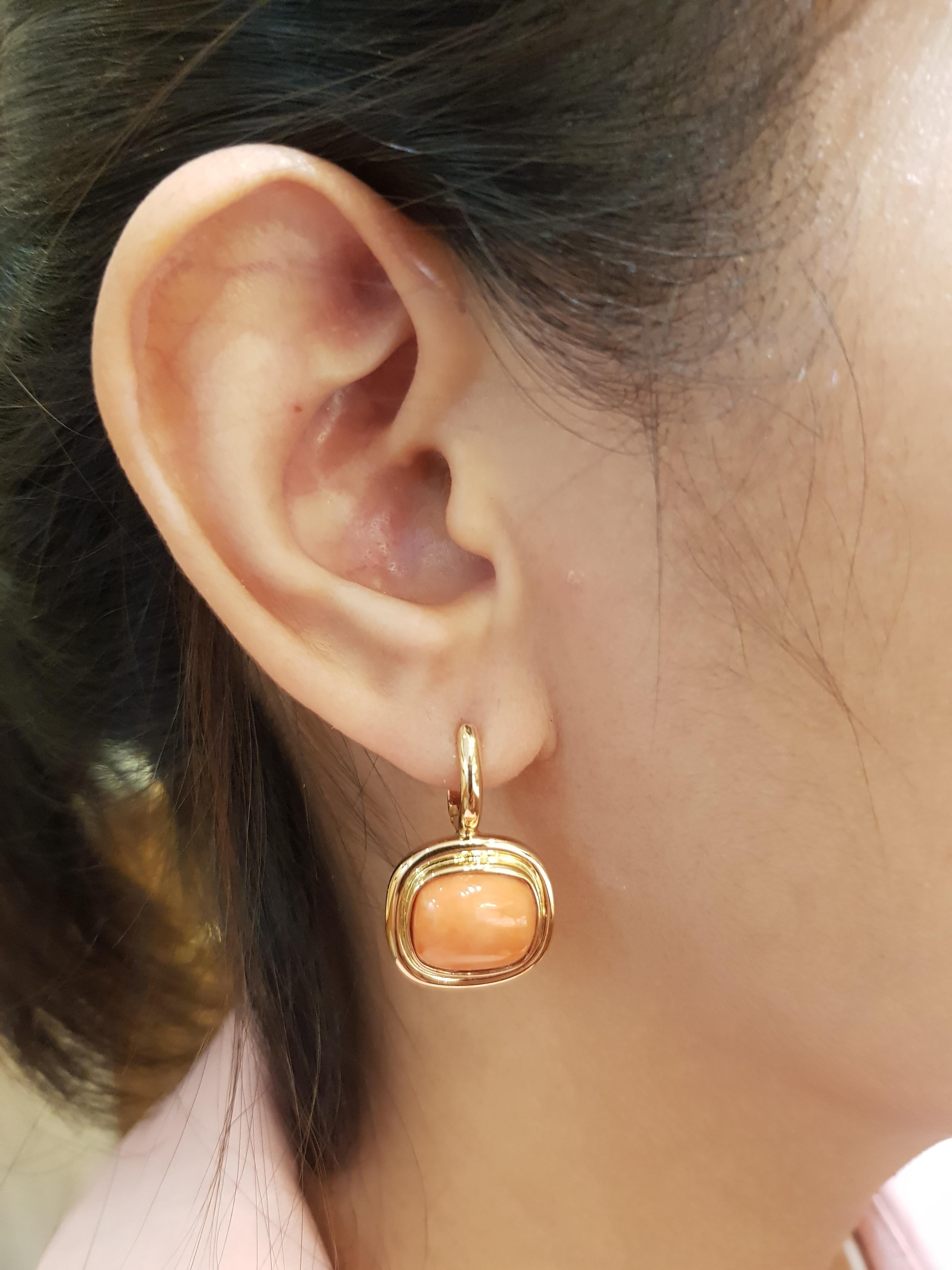 Coral 9.90 carat Earrings set in 18 Karat Rose Gold Settings

Width:  1.7 cm 
Length:  2.8 cm
Total Weight: 10.46 grams

