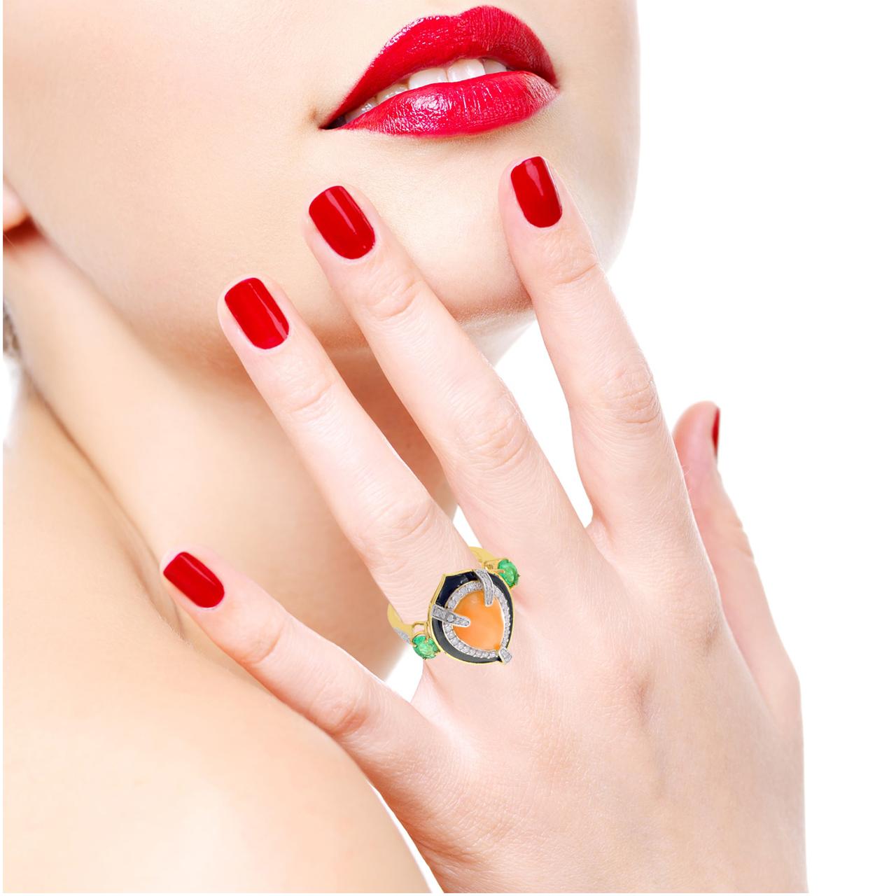 This ring has been meticulously crafted from 14-karat gold.  It is hand set with .60 carats diamond, 4.31 carats emerald & coral.   

The ring is a size 7 and may be resized to larger or smaller upon request. 
FOLLOW  MEGHNA JEWELS storefront to