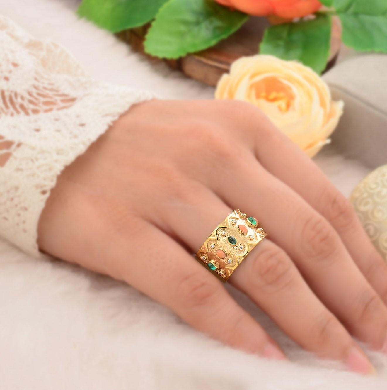 This ring has been meticulously crafted from 14-karat gold and adjustable.  It is hand set with .39 carats emerald and Coral.

Ring can be resized to larger or smaller upon request. 
FOLLOW  MEGHNA JEWELS storefront to view the latest collection &