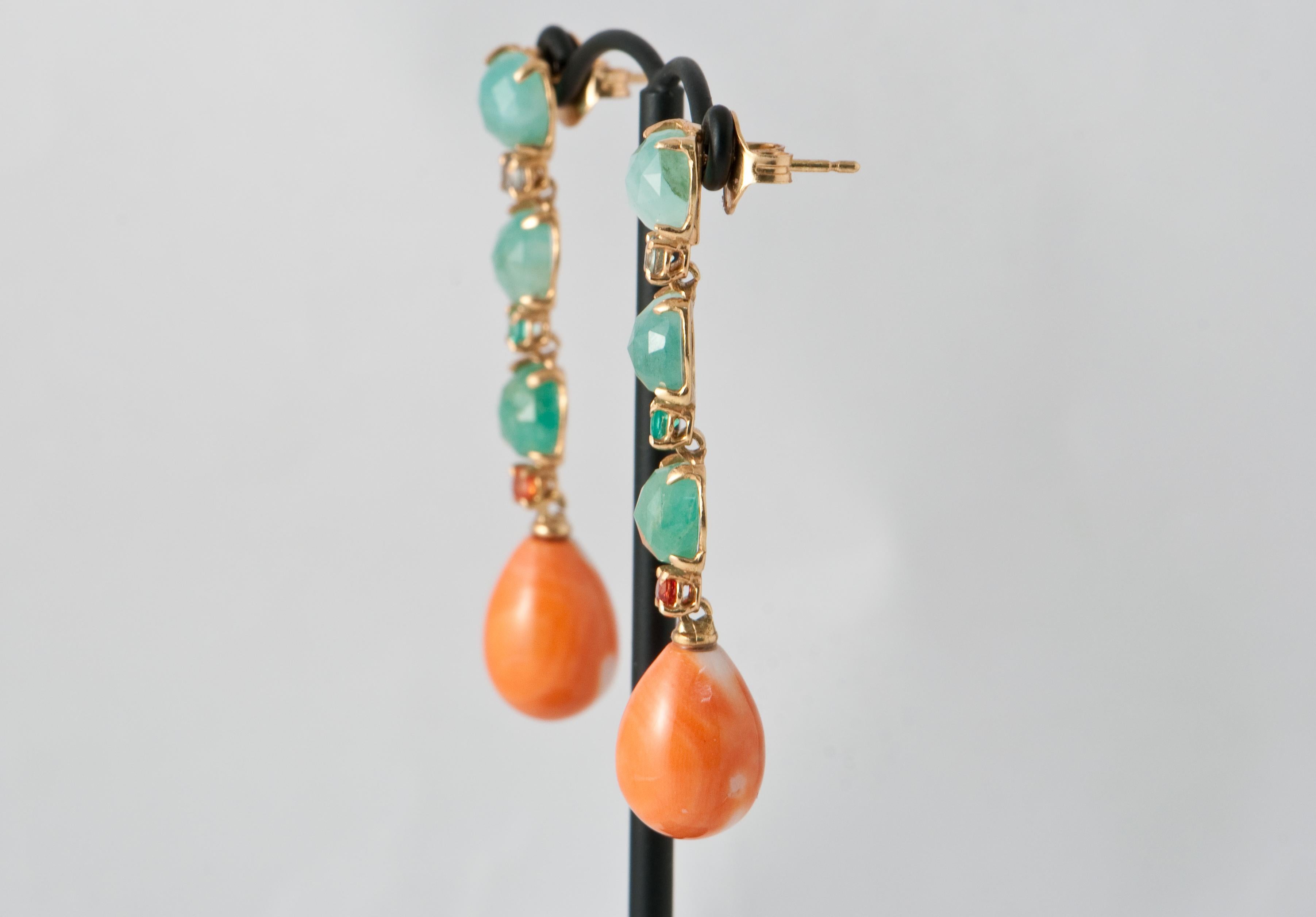 Yellow gold 18 Ct chandelier Earrings with
Natural Coral,
Emerald 1.6 ct
Sapphires 0.48 ct
4 grams