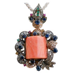 Colgante de Coral, Esmeraldas, Rubíes, Zafiros, Diamantes, Oro Rosa y Plata.