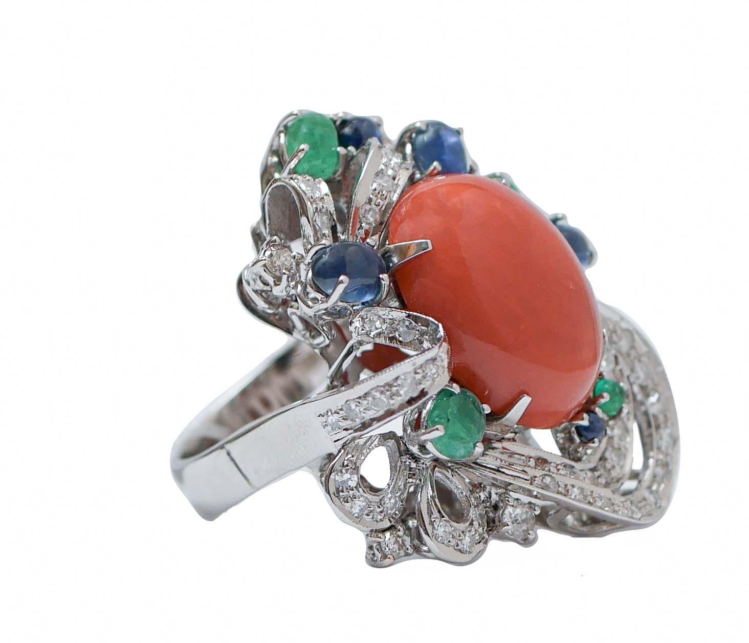 Fantastic ring in 14 kt white gold structure mounted with a central coral surrounded by diamonds, emeralds and sapphires.
This ring was totally handmade by Italian master goldsmiths and it is in perfect conditions.
Diamonds 1.09 ct
Emeralds and