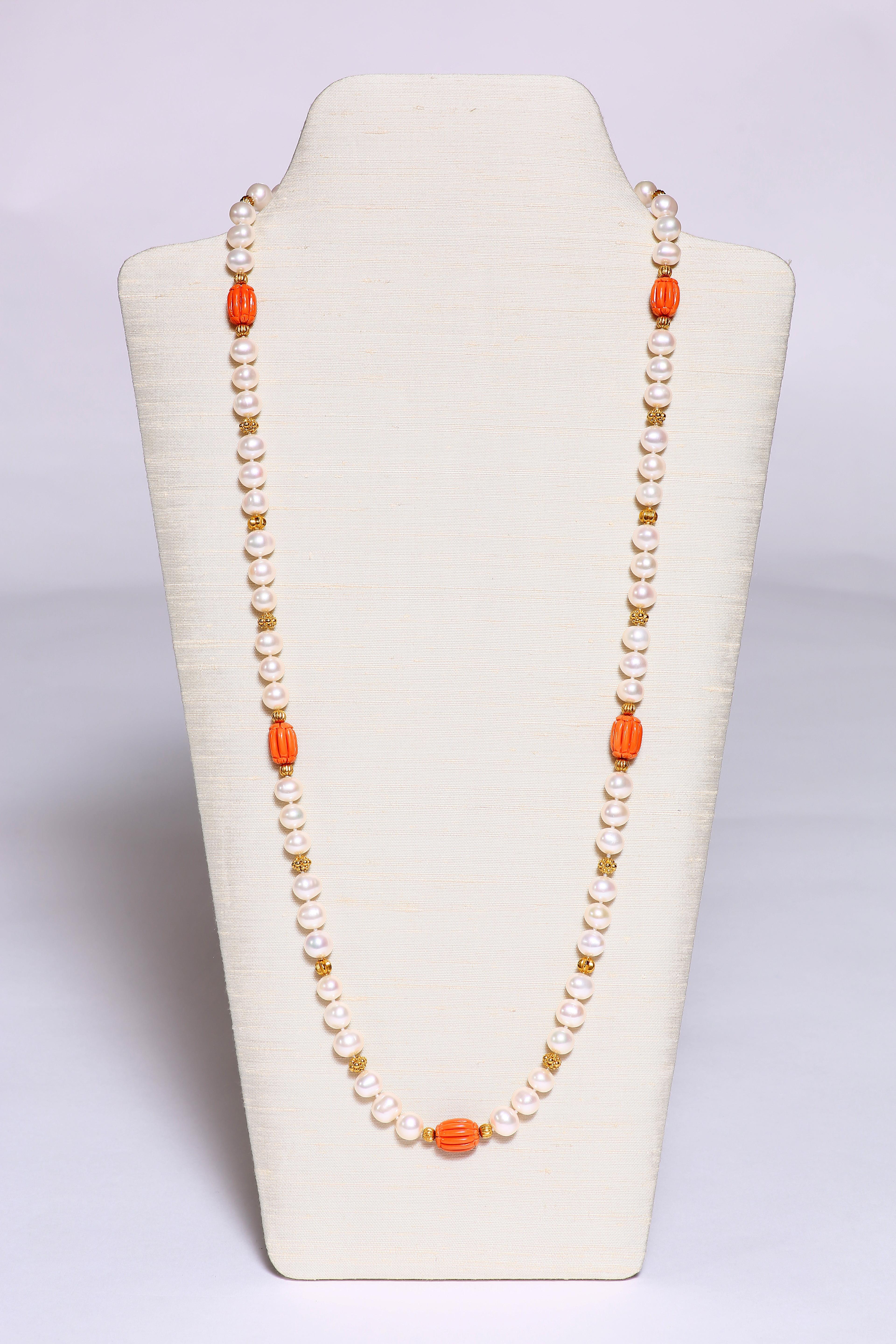 Sardinian coral, freshwater pearls and faceted gold beads form this stunning long 32 1/2